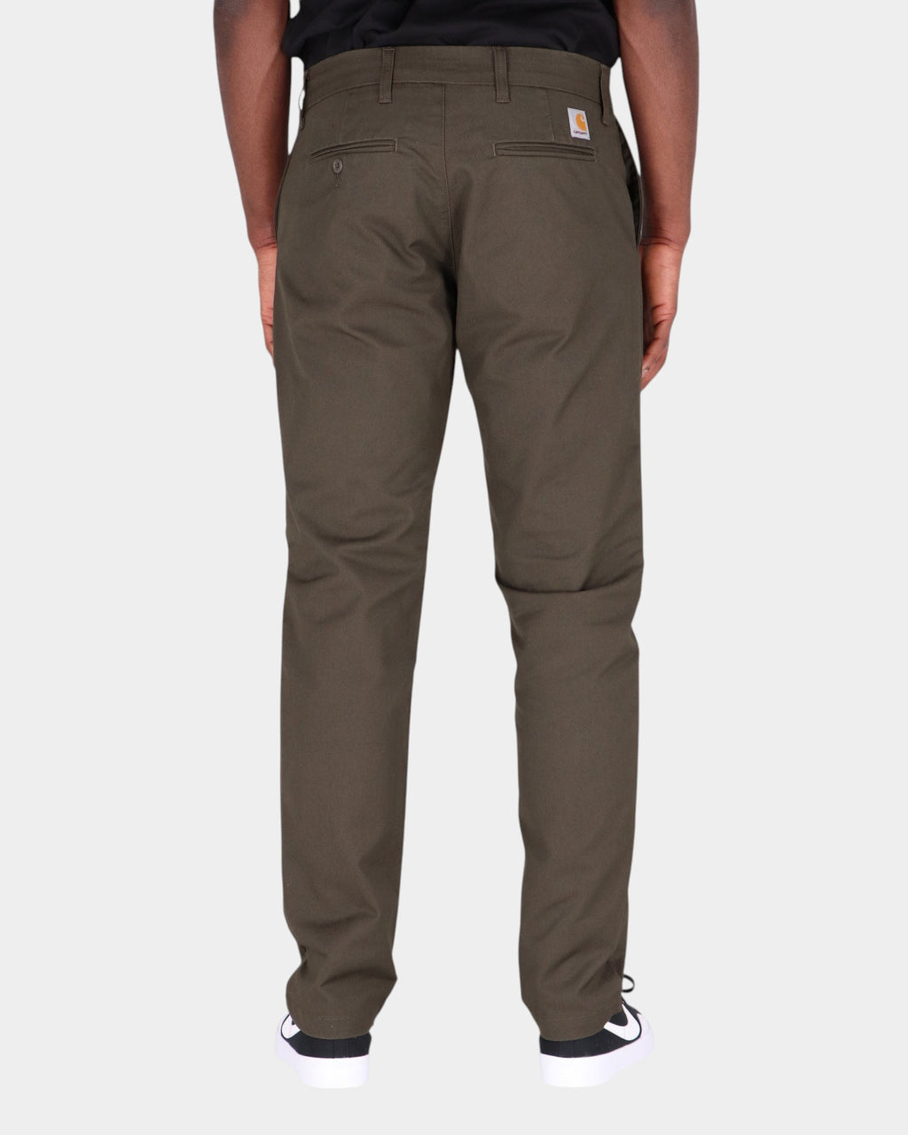 Lockwood Avenue Carhartt Sid slim tapered chinos in dark olive cotton twill, back view with square logo label