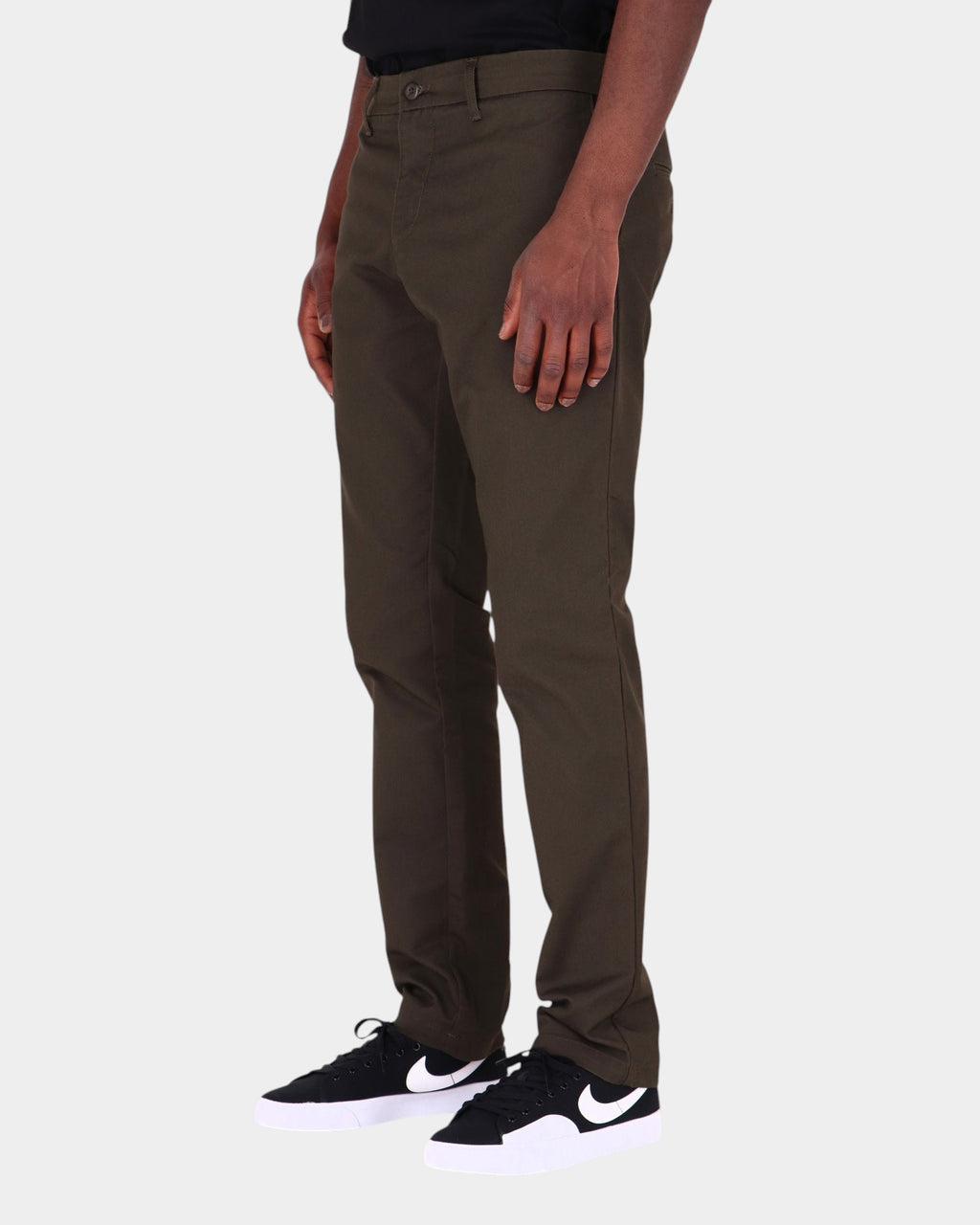 Lockwood Avenue Carhartt Sid slim tapered chinos in dark olive cotton-polyester twill worn by a model