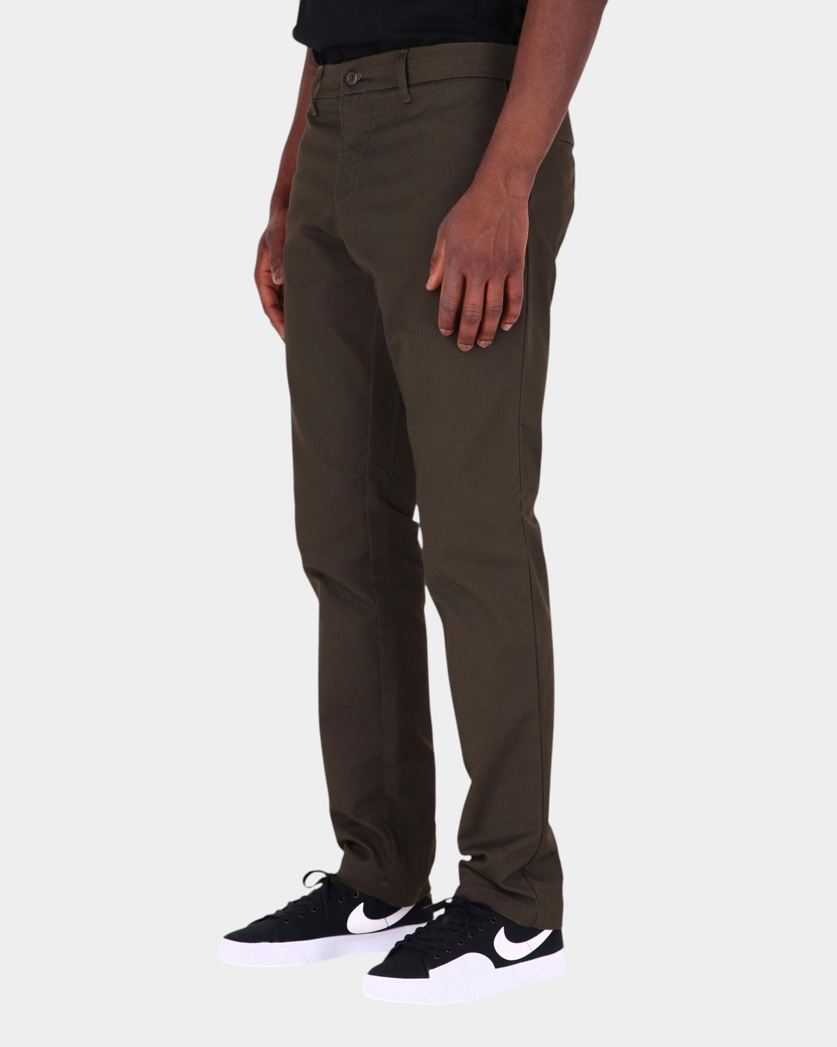 Lockwood Avenue Carhartt Sid slim tapered chinos in dark olive cotton-polyester twill worn by a model
