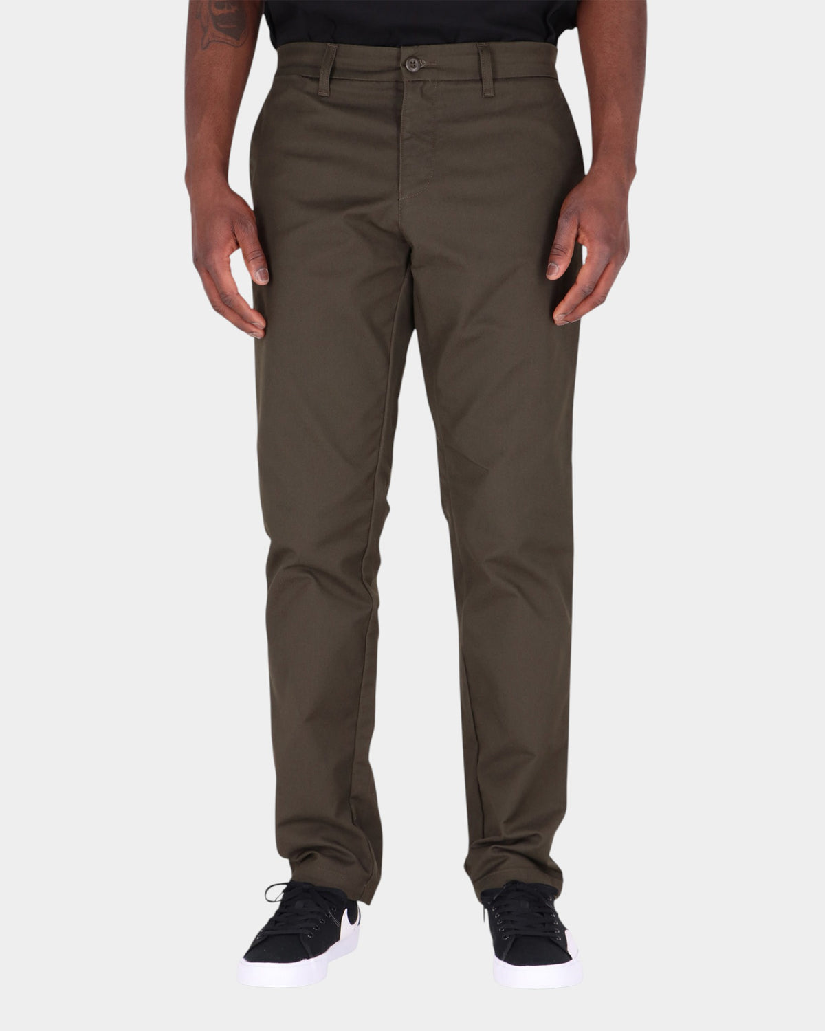 Lockwood Avenue Carhartt Sid slim tapered chinos in olive green cotton-polyester twill worn by a model
