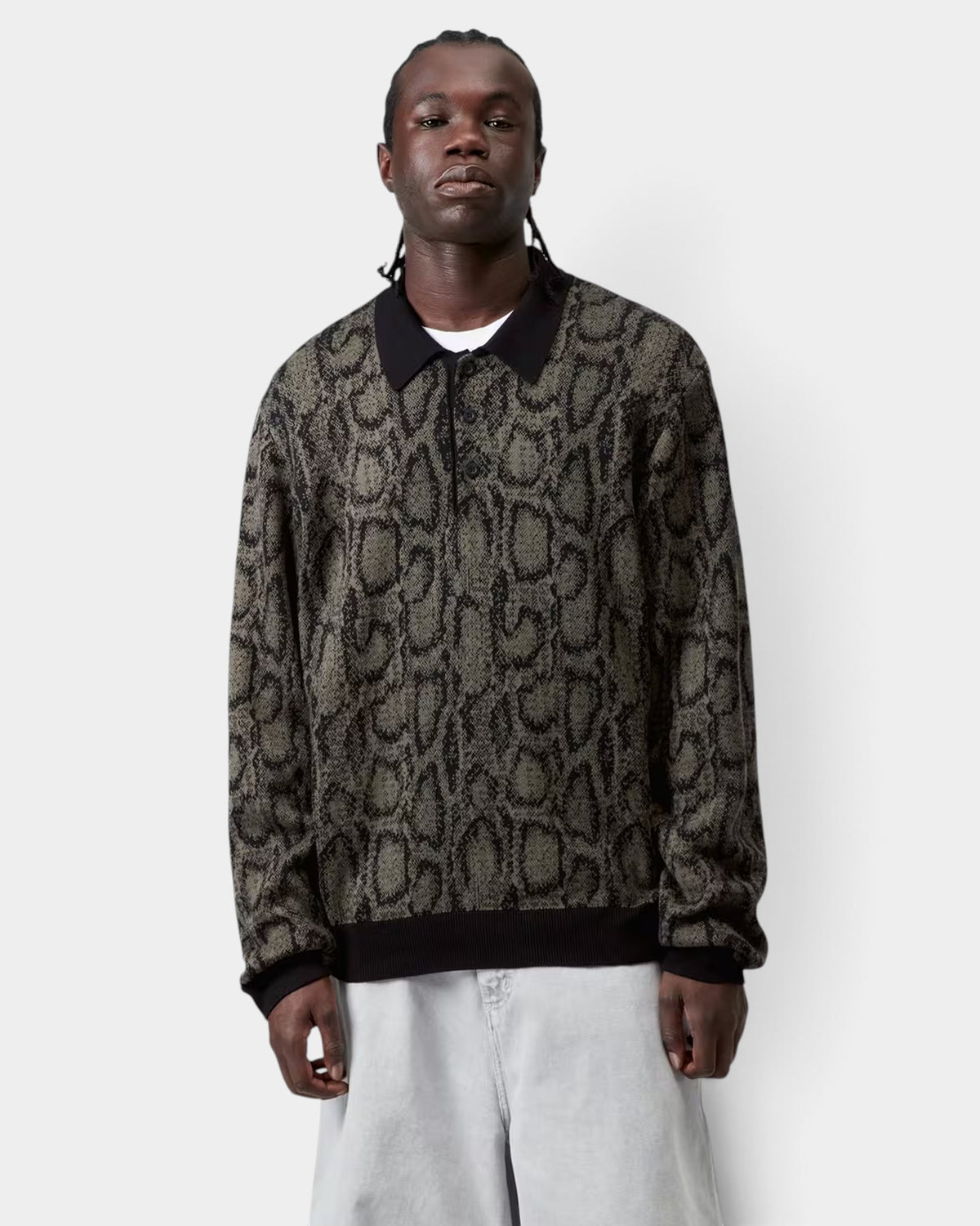 Lockwood Avenue Carhartt long-sleeve polo in olive and black snake jacquard knit with a contrasting collar and cuffs.
