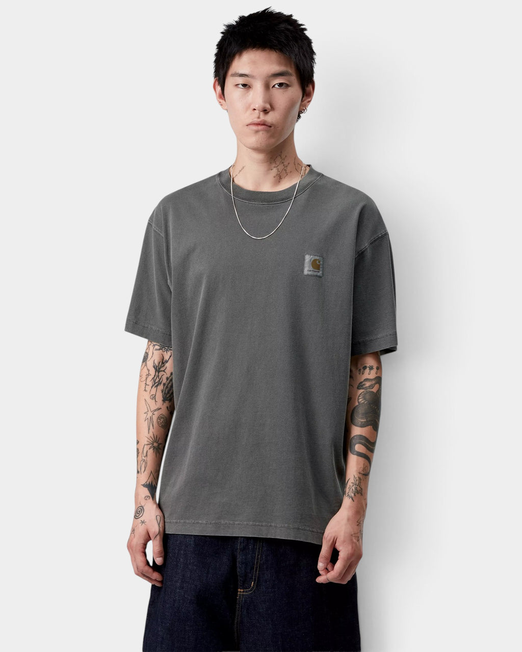 Lockwood Avenue Carhartt Vista T-Shirt in washed charcoal grey cotton jersey with a chest square label on a model