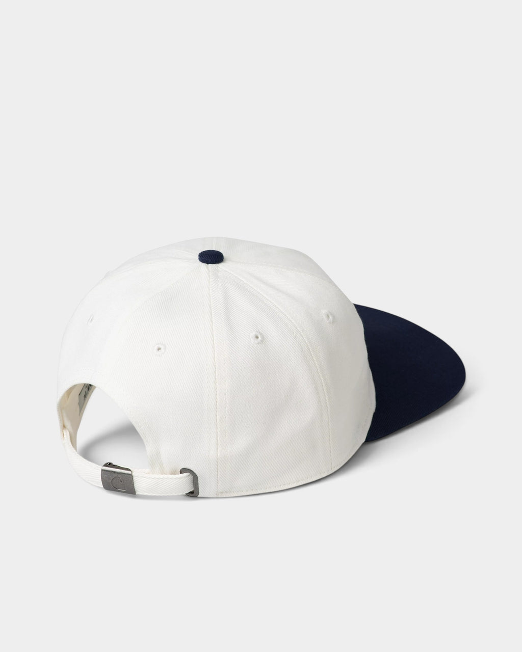 Lockwood Avenue Carhartt Wild Dog cap in white cotton twill with a navy brim and adjustable metal buckle strap