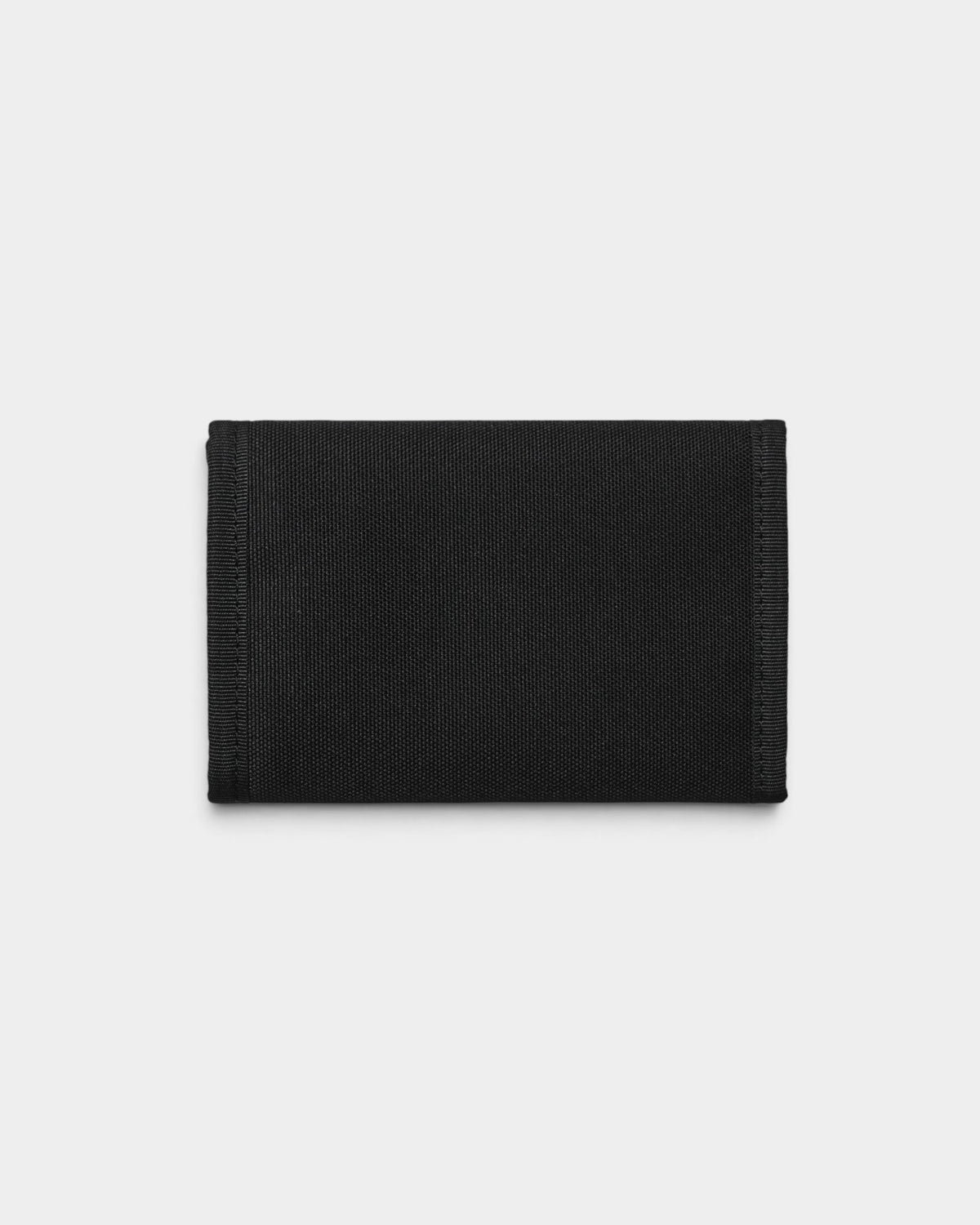 Lockwood Avenue Carhartt WIP Alec wallet in black water-repellent polyester duck canvas with square label detail.