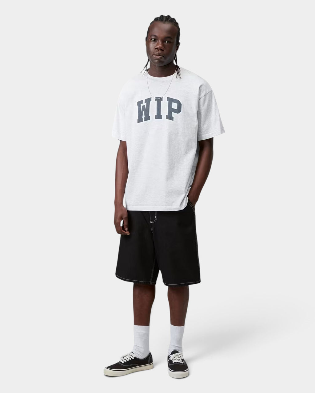 Lockwood Avenue model wearing a loose fit grey stone-washed organic cotton Carhartt WIP III t-shirt with chest graphic
