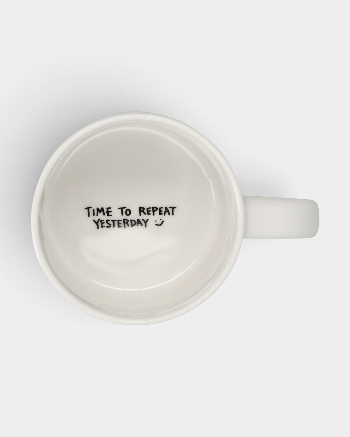 Lockwood Avenue ceramic stacking mug interior view with Time to Repeat Yesterday message printed on the bottom