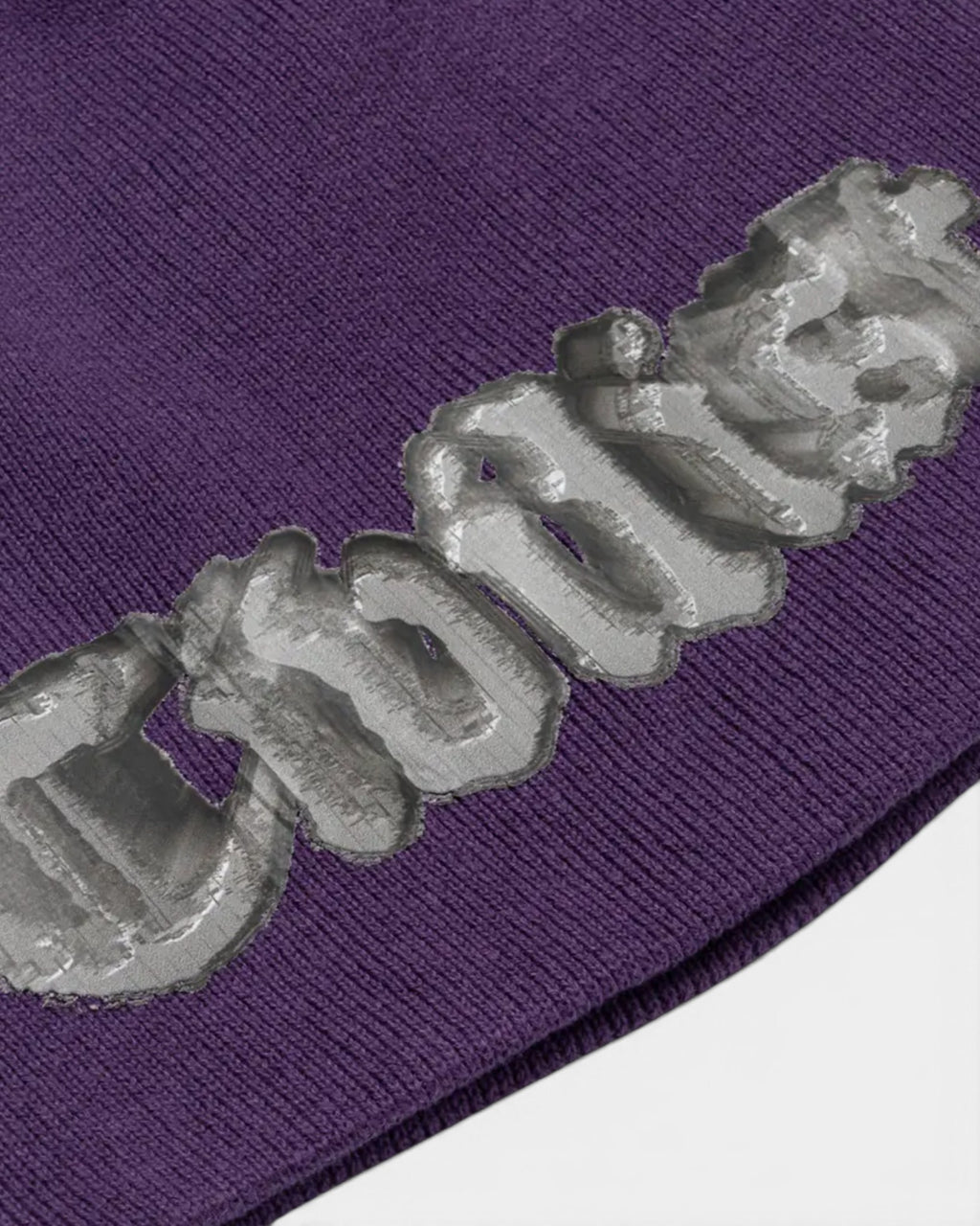 Lockwood Avenue purple acrylic knit beanie featuring the Civilist skull graphic artwork in a textured print.