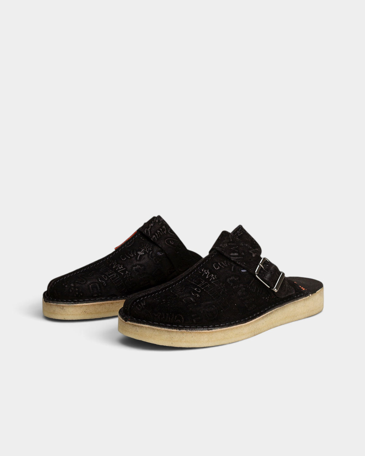 Lockwood Avenue Clarks Originals x Civilist black suede Trek Mule slip-on shoes with debossed logos and crepe sole.