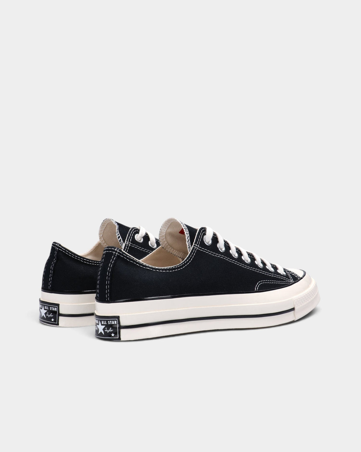 Lockwood Avenue Converse Chuck 70 low-top sneakers in black premium canvas with egret off-white rubber midsoles.