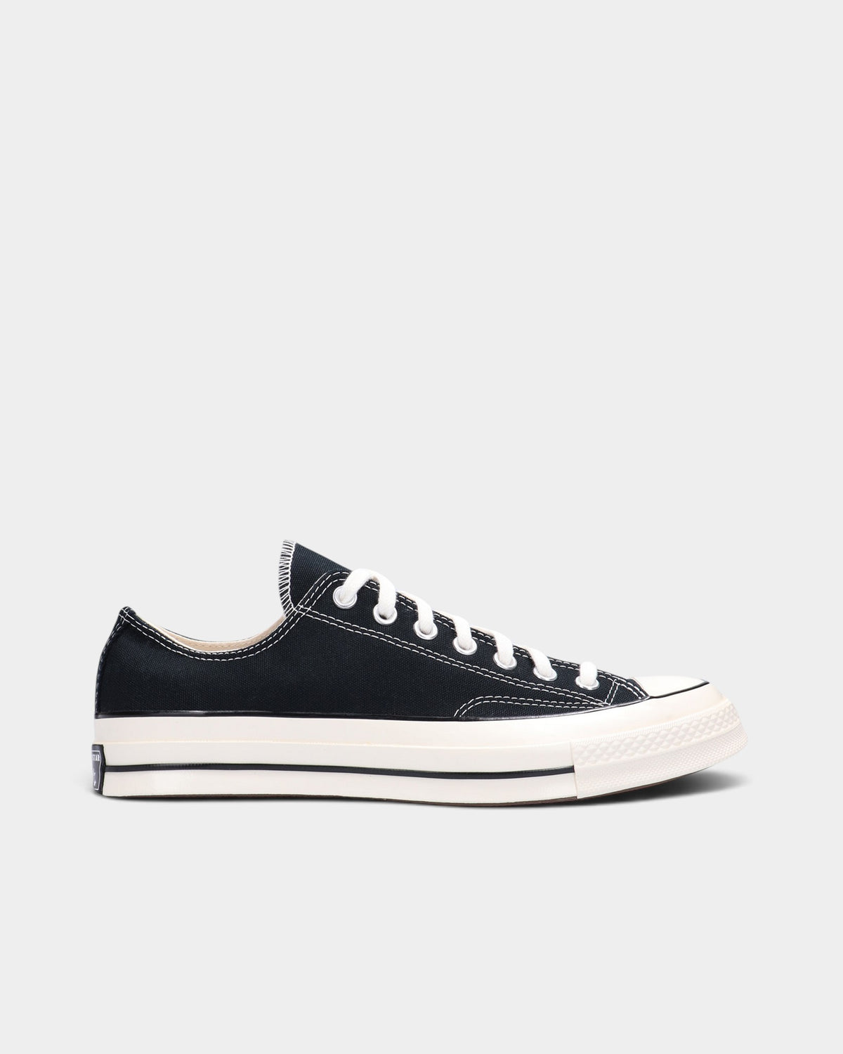 Lockwood Avenue Converse Chuck 70 low-top sneakers in black premium canvas with an egret off-white rubber midsole.