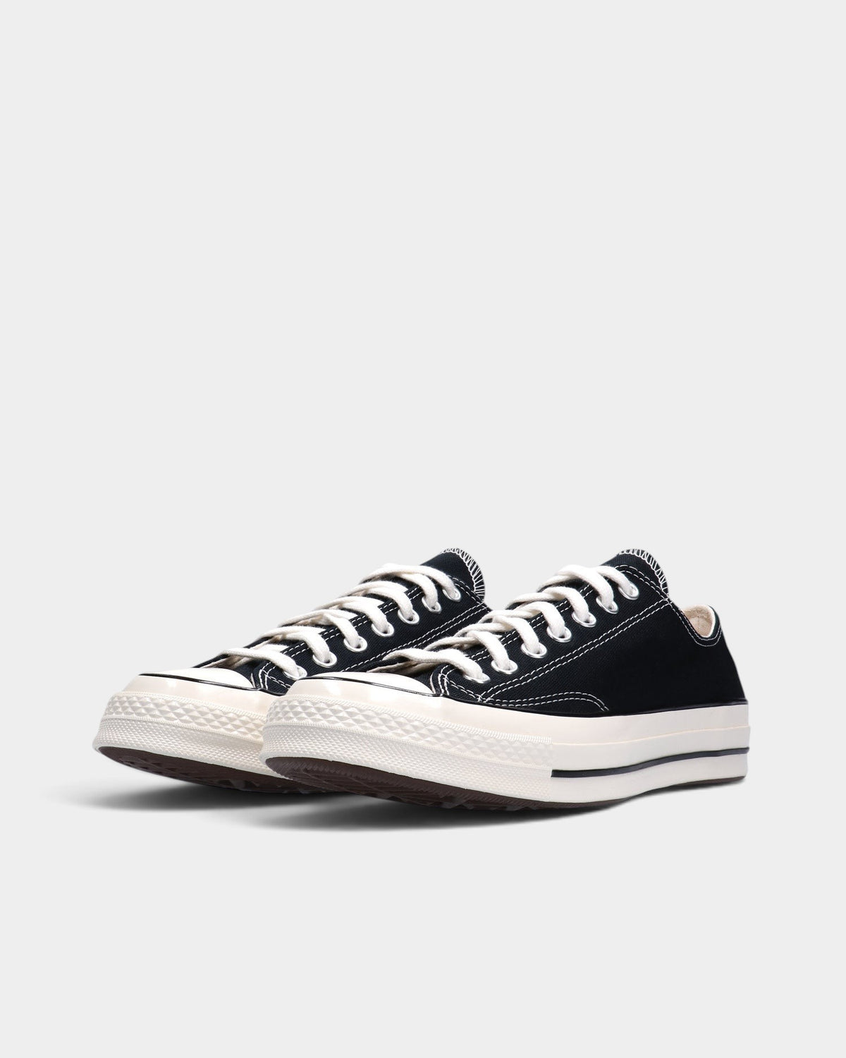 Lockwood Avenue Converse Chuck 70 low-top sneakers in black premium canvas with an egret off-white rubber midsole.