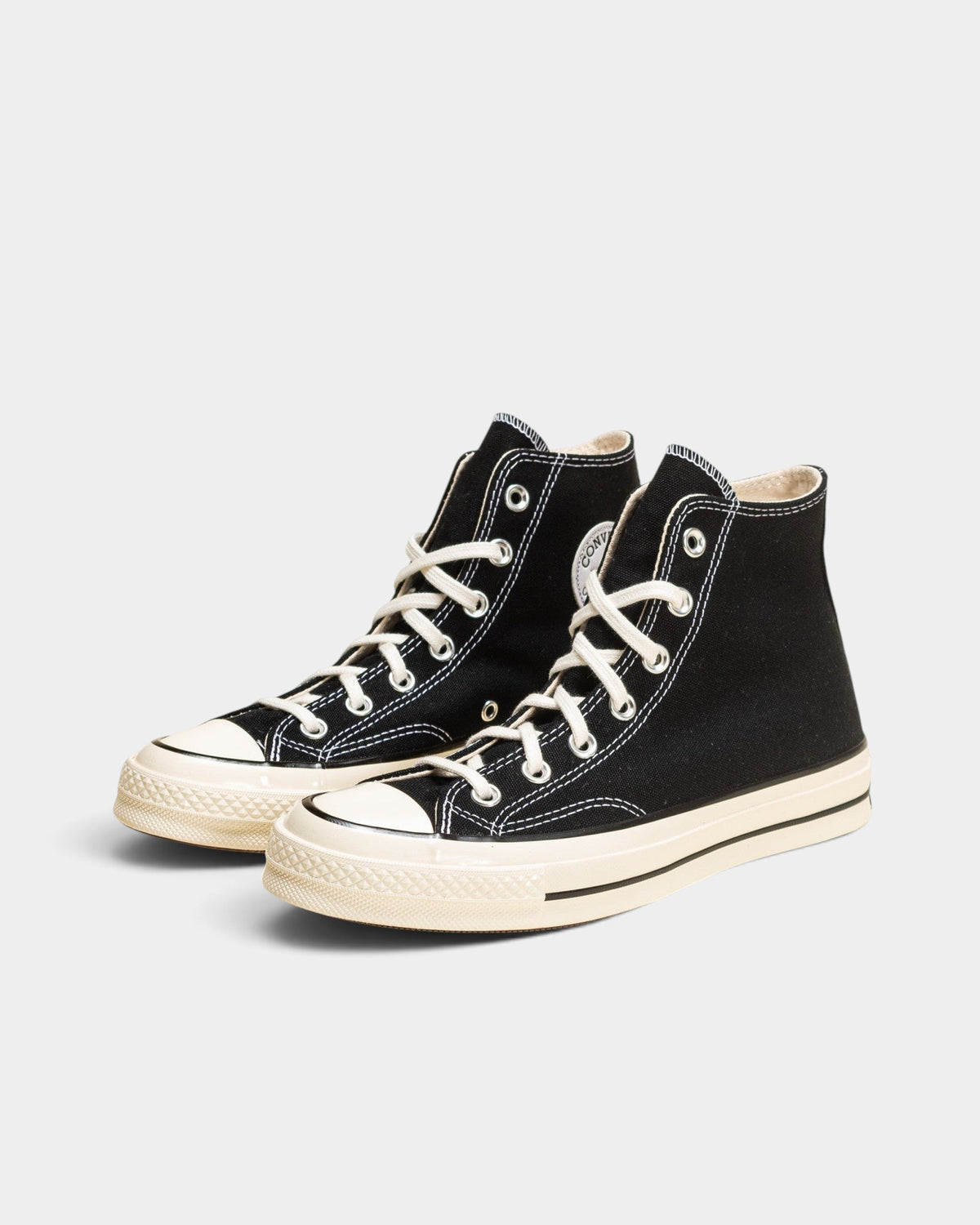 Lockwood Avenue Converse Chuck 70 Hi shoes in black canvas with an egret off-white midsole and rubber toe cap.