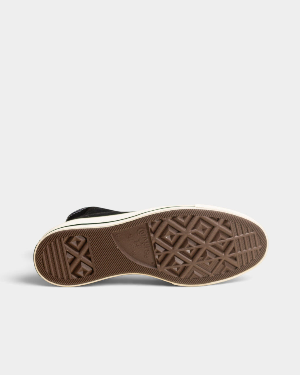 Lockwood Avenue Converse Chuck 70 Hi shoe showing the brown vulcanized rubber outsole with diamond tread pattern