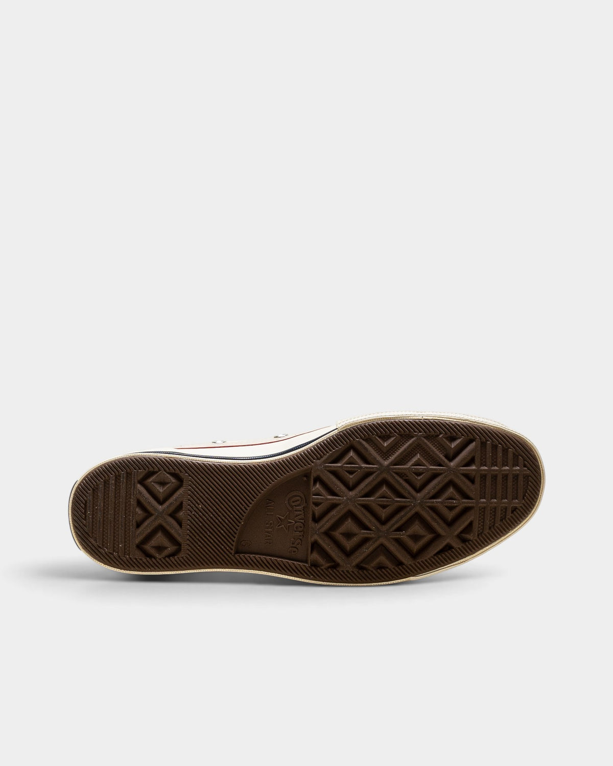 Lockwood Avenue Converse Chuck 70 Hi shoe showing the brown vulcanized rubber outsole with diamond tread pattern