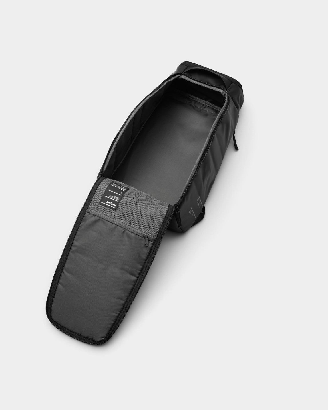 Lockwood Avenue DB Journey Hugger 25L backpack in black, shown fully opened to display the spacious main compartment.