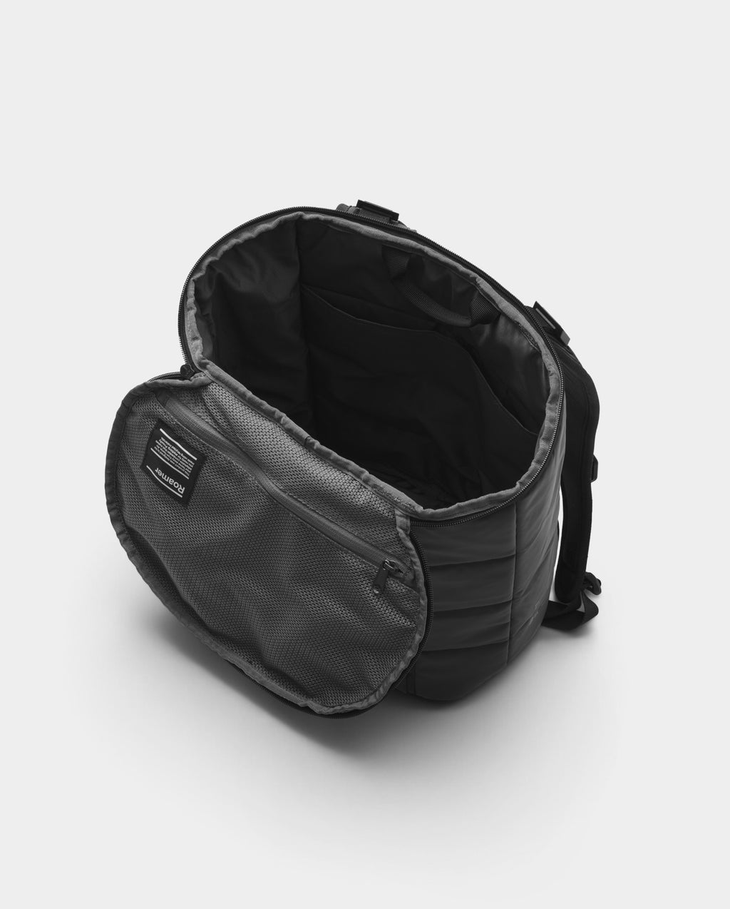 Lockwood Avenue DB Journey Roamer 25L black duffel backpack with open barrel-style lid and internal mesh pocket