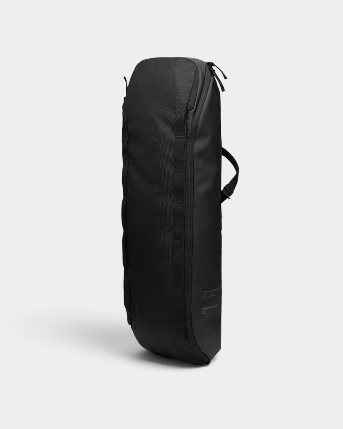 Lockwood Avenue DB Journey black 32L weather-resistant skateboard carrier bag with side-access and crossbody strap.