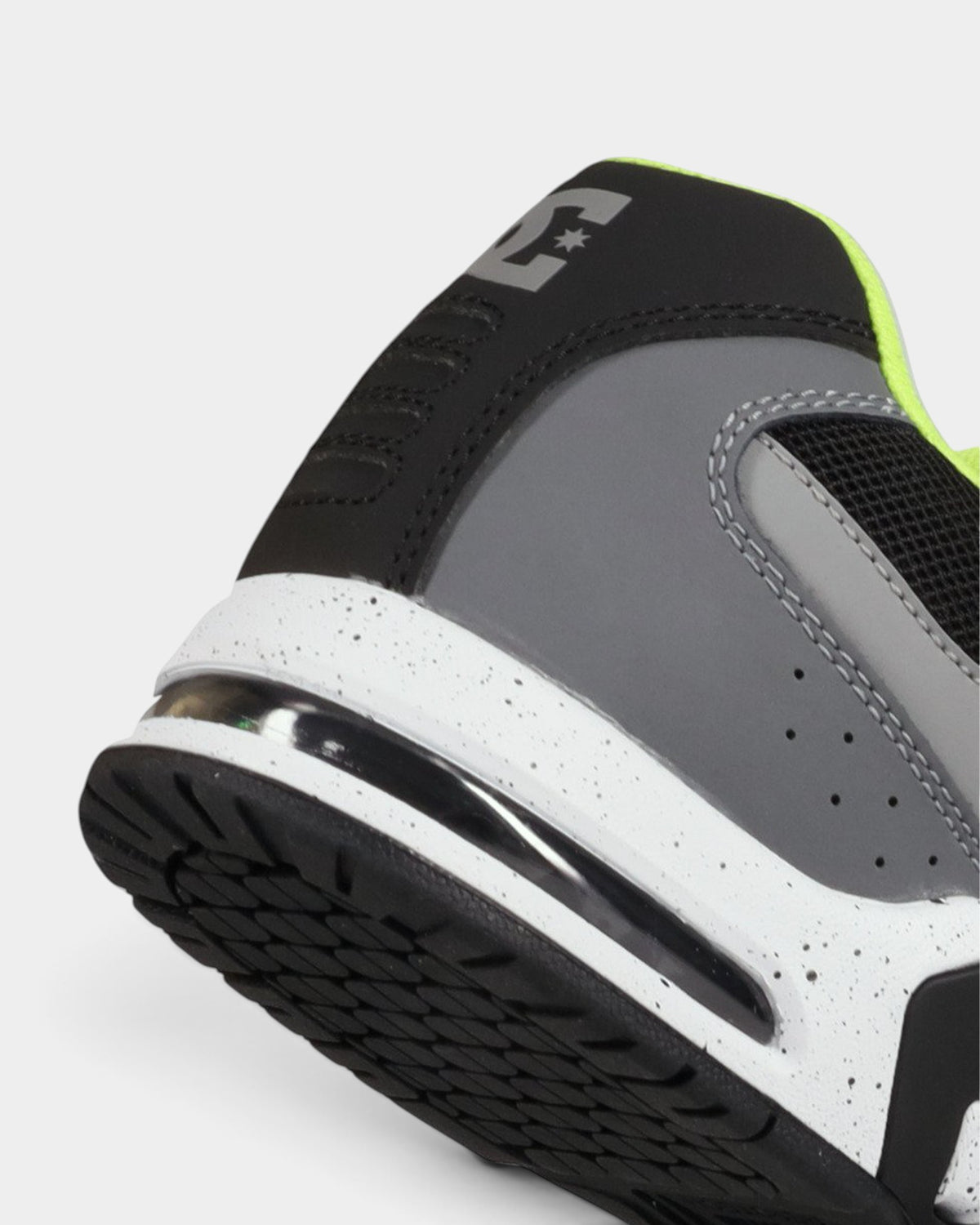 Lockwood Avenue DC AT-2 skate shoe heel detail showing gray and black panels, lime lining, and airbag cushioning.