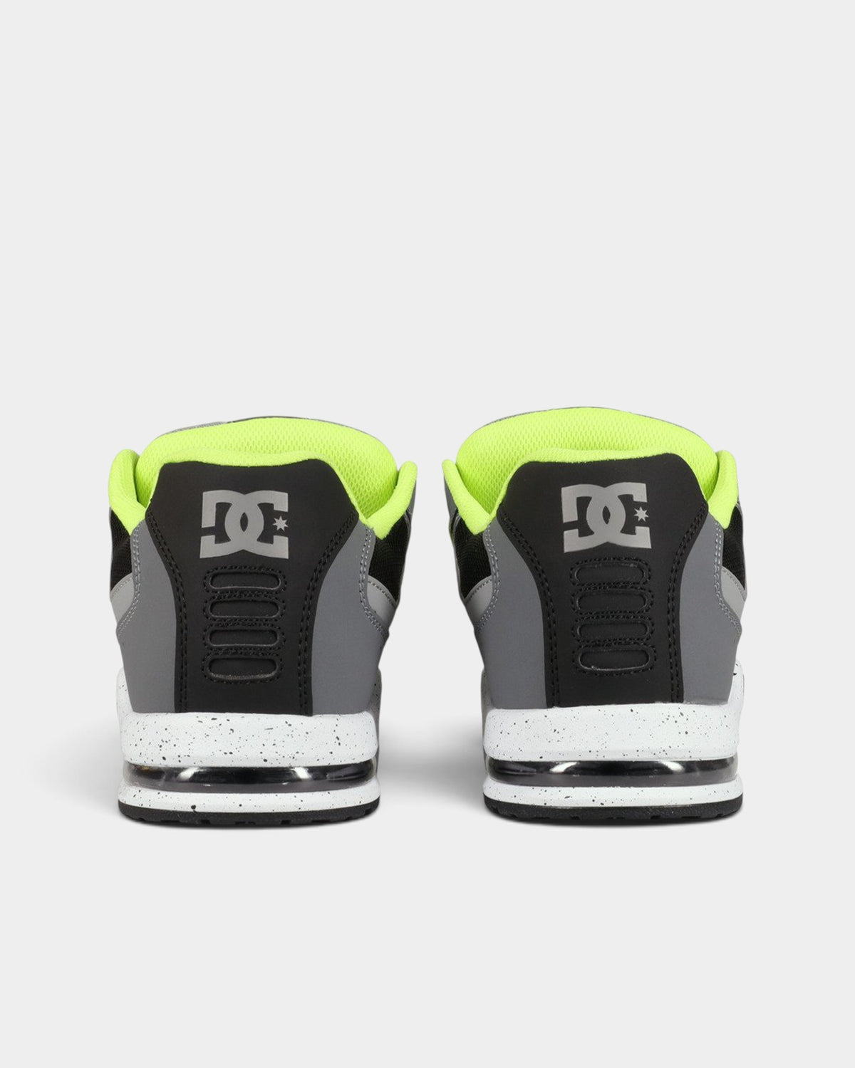 Lockwood Avenue DC AT-2 skate shoes in grey and black with lime green lining and speckled airbag outsoles, rear view.