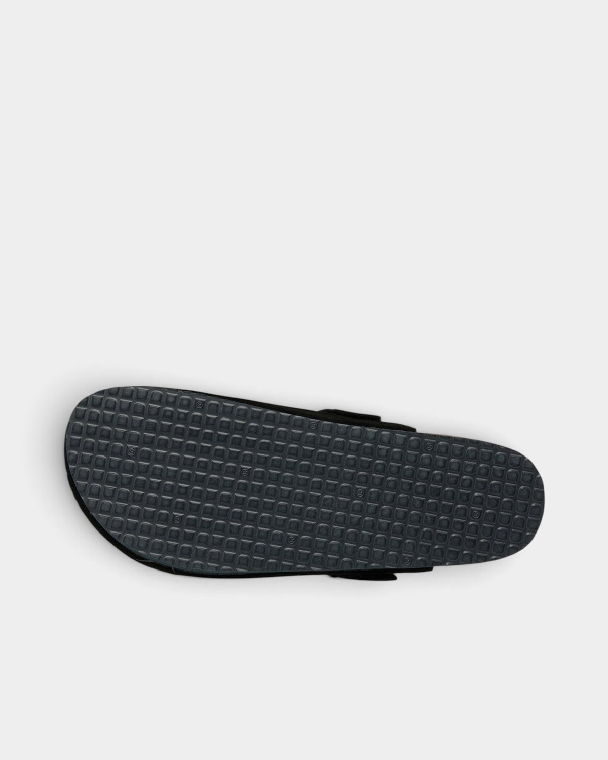 Lockwood Avenue DC Liege black suede slide sandal showing the textured rubber outsole pattern