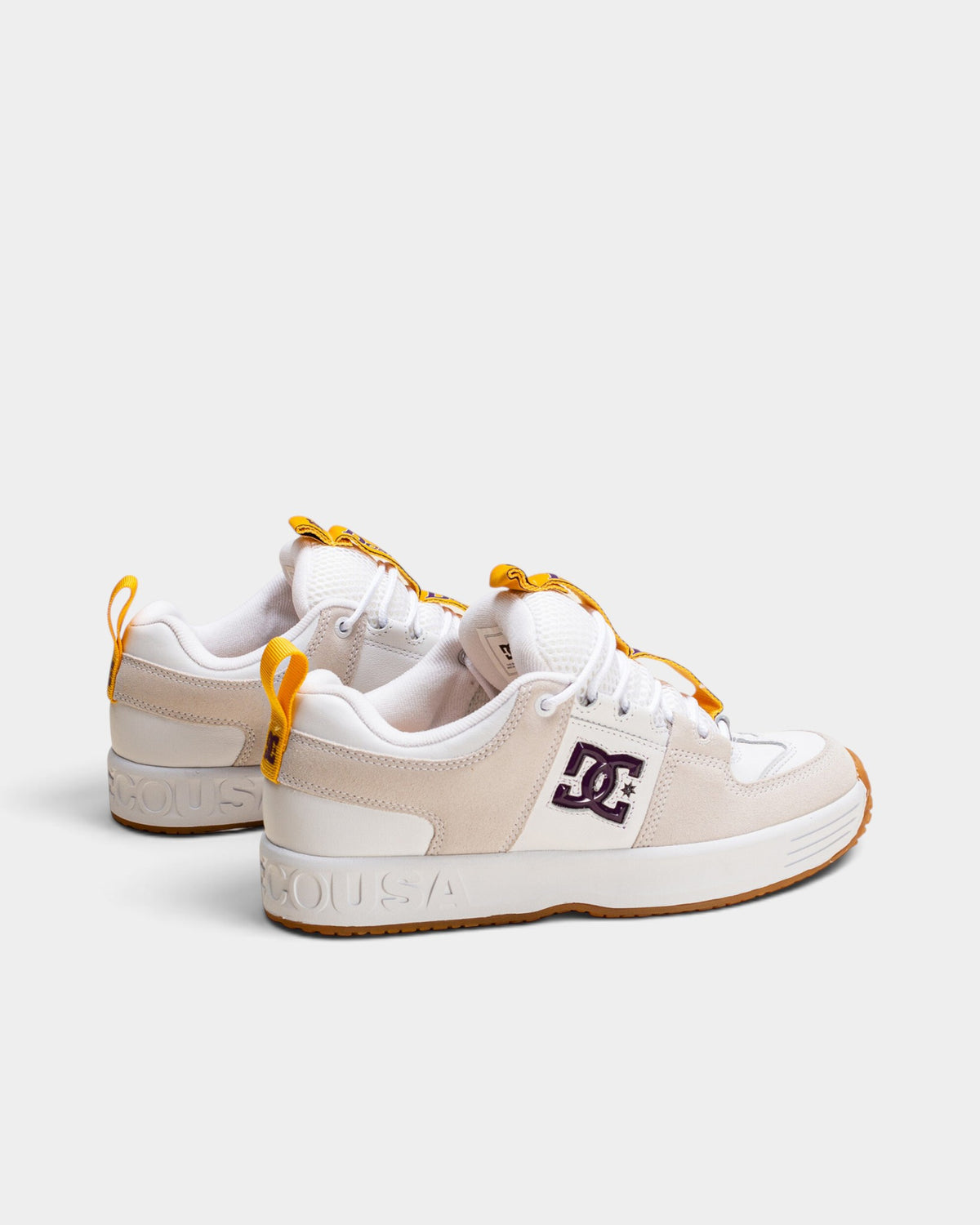 Lockwood Avenue DC Lynx OG skate shoes in white leather and suede with purple logo and yellow pull tabs