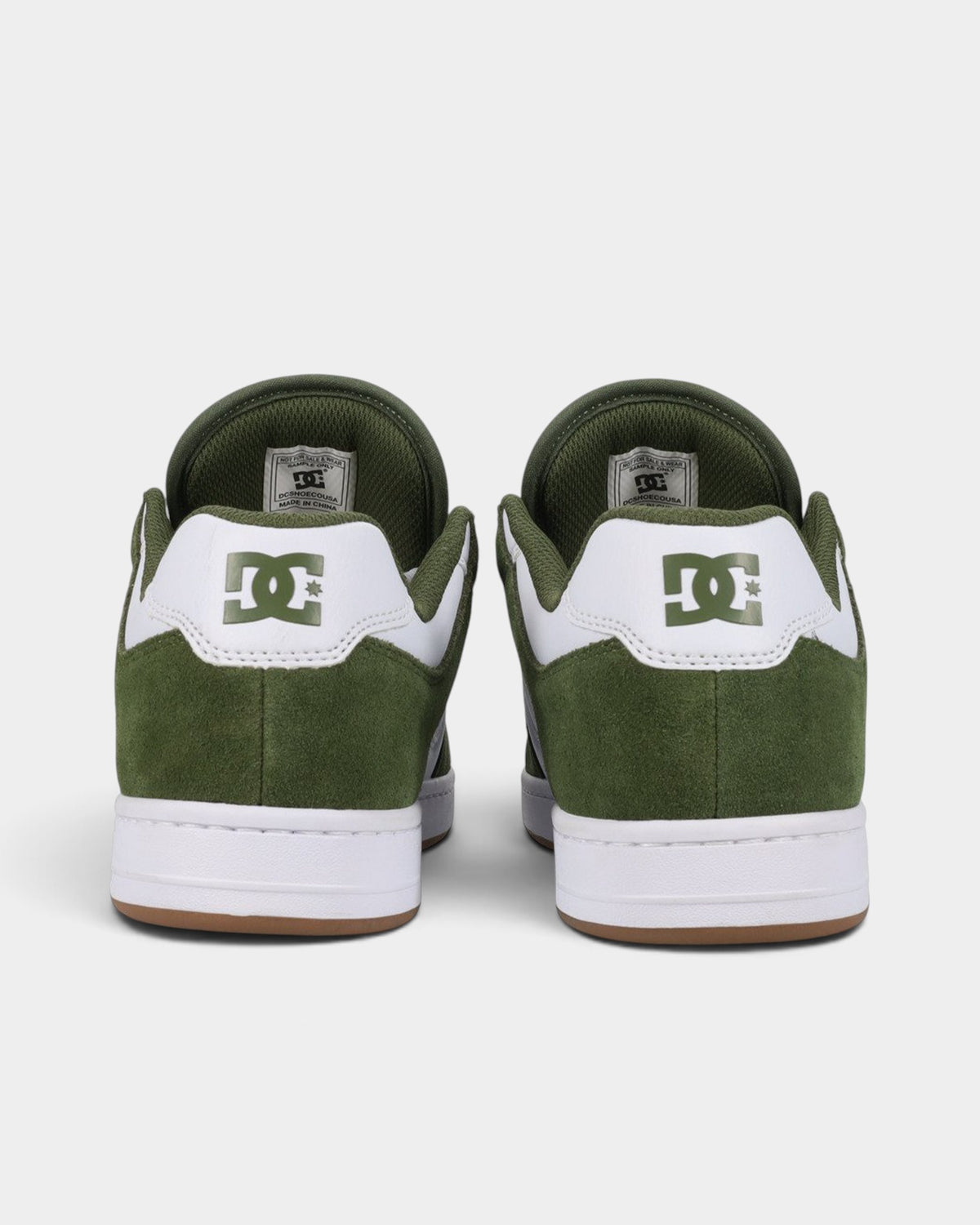Lockwood Avenue DC Manteca skate shoes in olive suede and leather with white heel tabs and gum rubber outsoles.