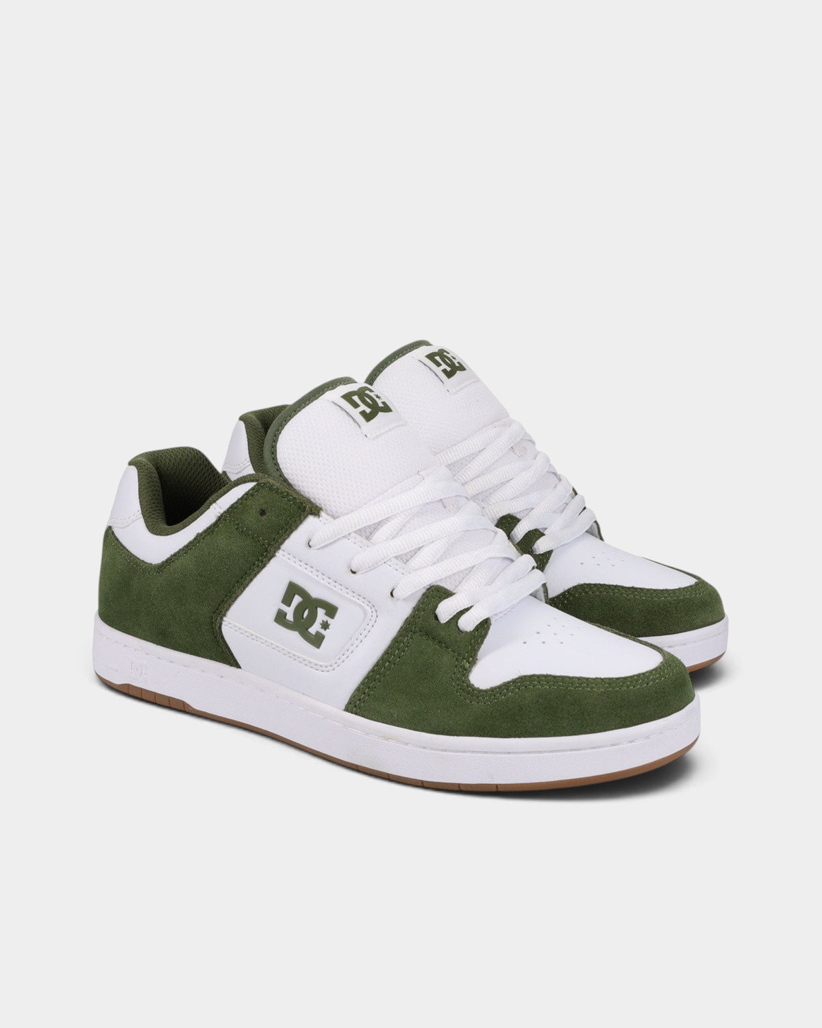 Lockwood Avenue DC Manteca skate shoes in olive suede and white leather with a durable cupsole and pill pattern tread