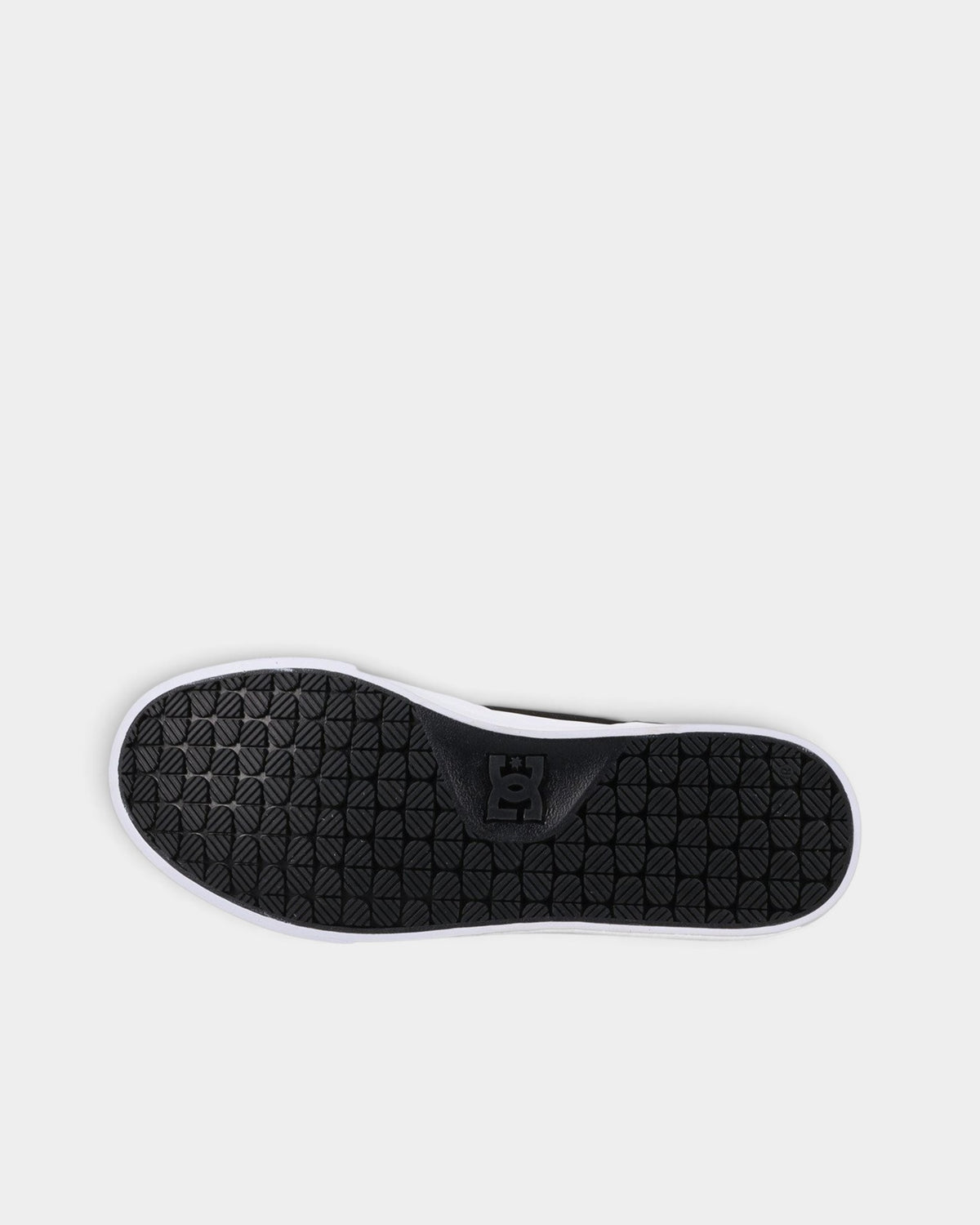 Lockwood Avenue DC Onyx S skate shoe featuring a black vulcanized rubber outsole with signature pill tread pattern.