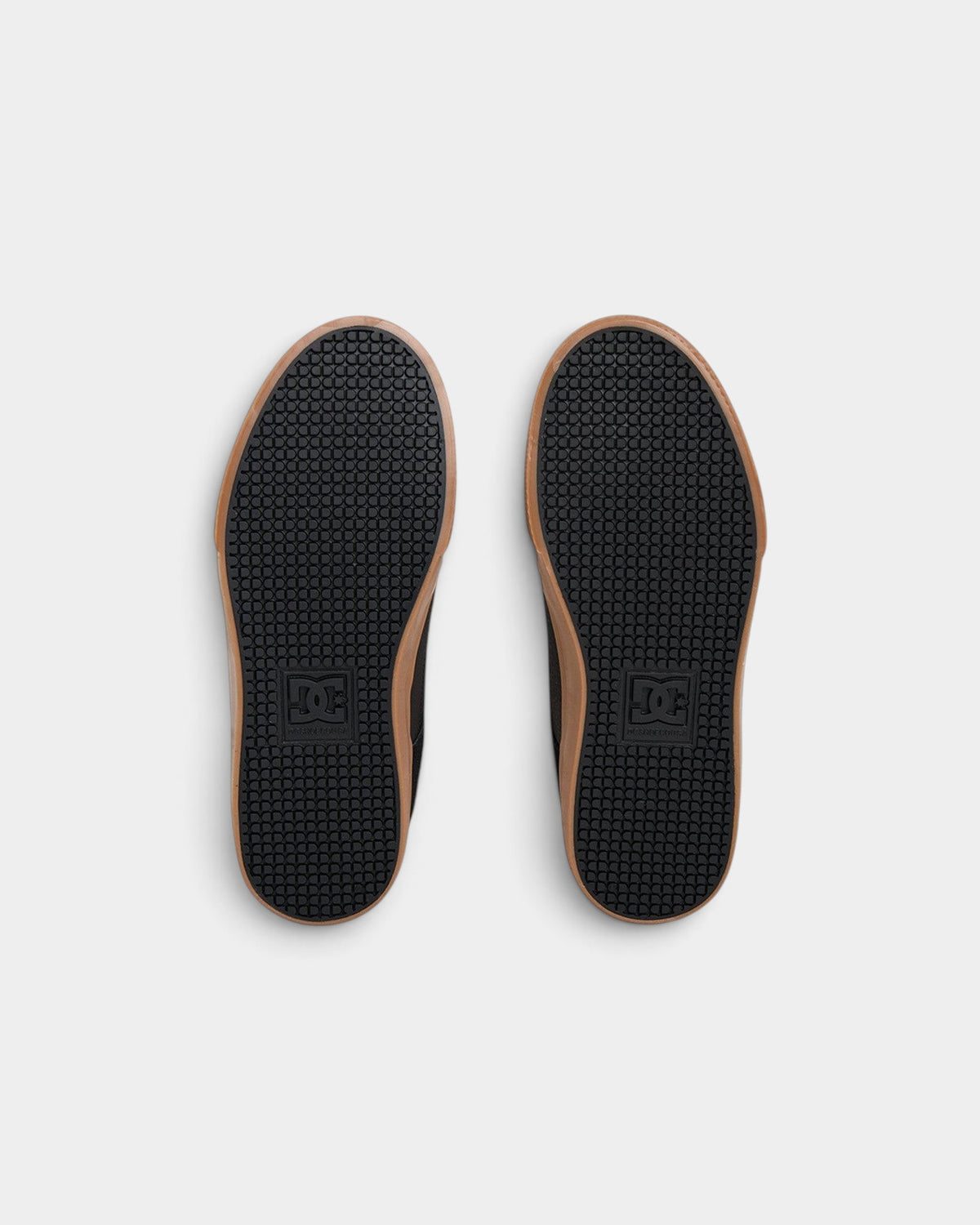 Lockwood Avenue DC Pure high-top skate shoes featuring black rubber outsoles with signature Pill Pattern tread