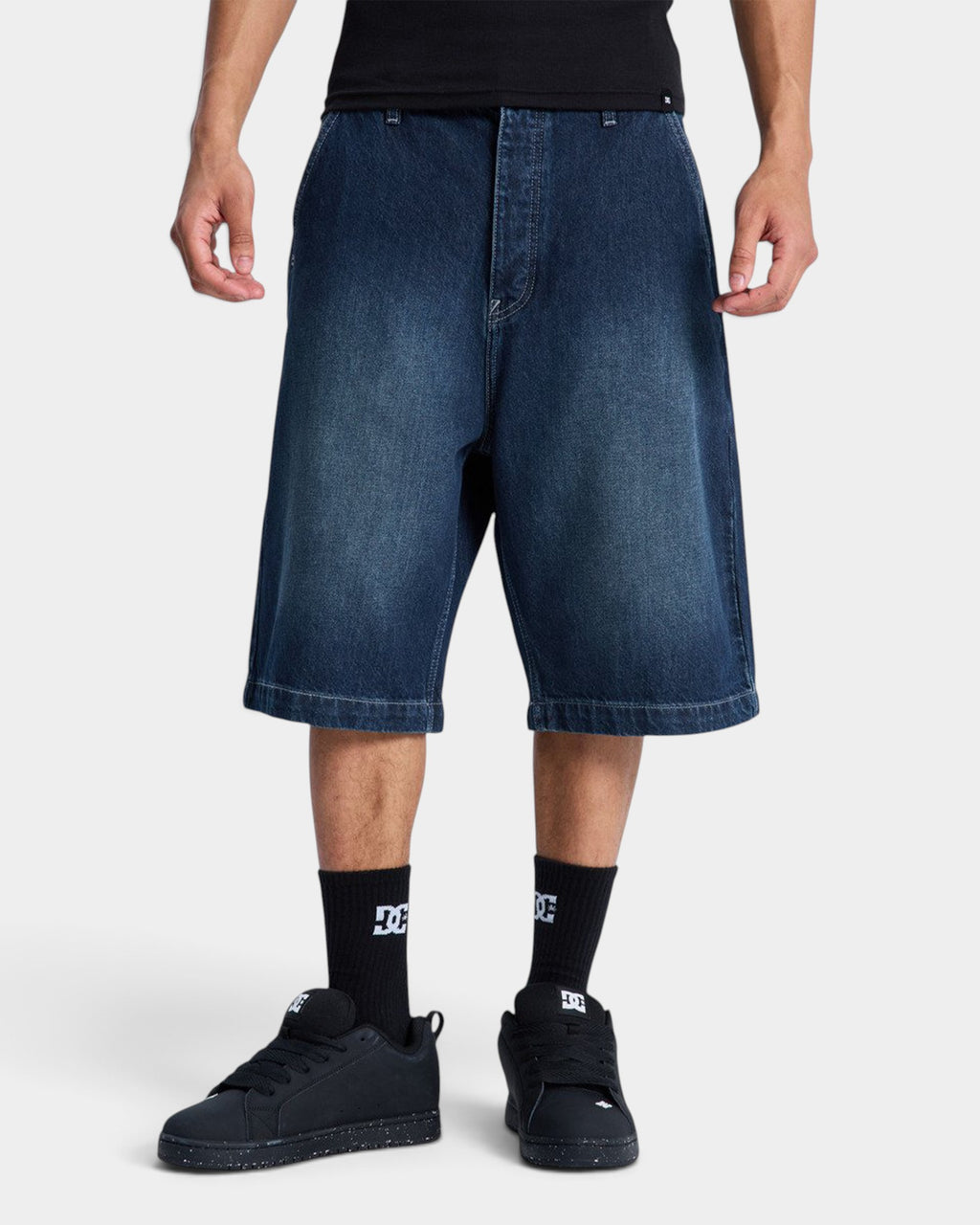 Lockwood Avenue DC Shoes baggy dark denim jorts for men with an 11-inch inseam and recycled cotton blend fabric.