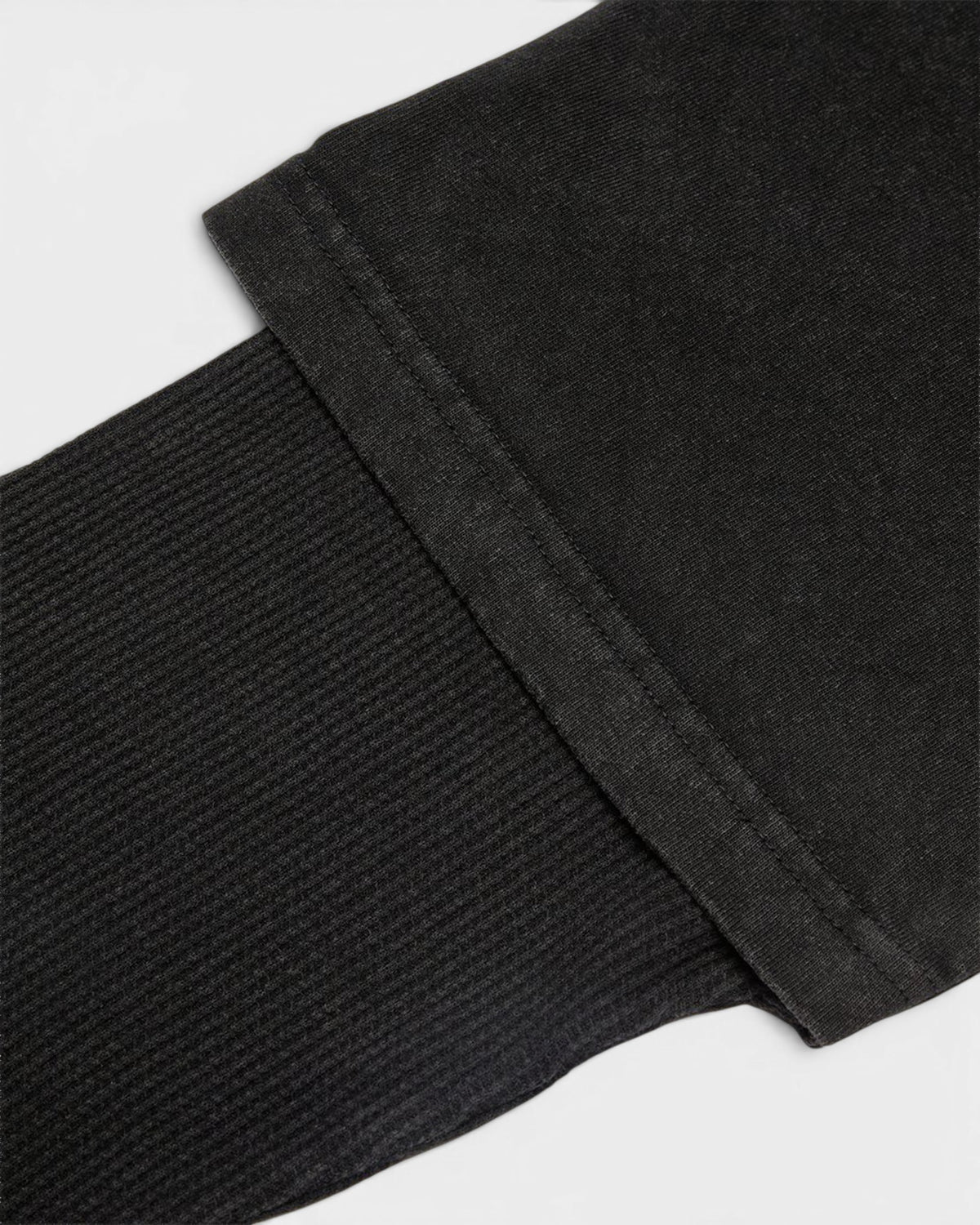 Lockwood Avenue DC Twofer long sleeve t-shirt in black featuring a layered ribbed cuff detail