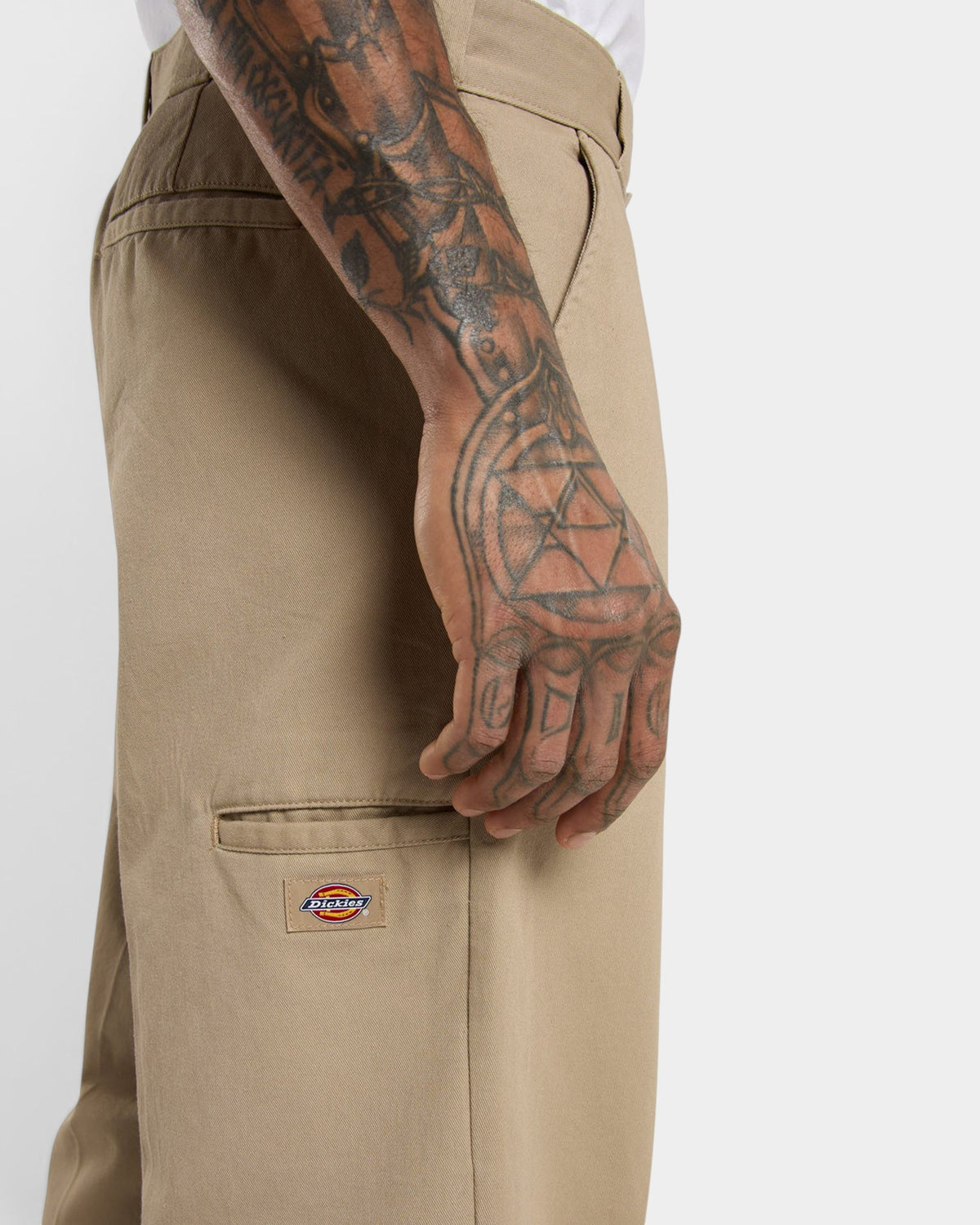 Lockwood Avenue Dickies 247 loose work pants in beige cotton twill with a welt pocket and woven brand label