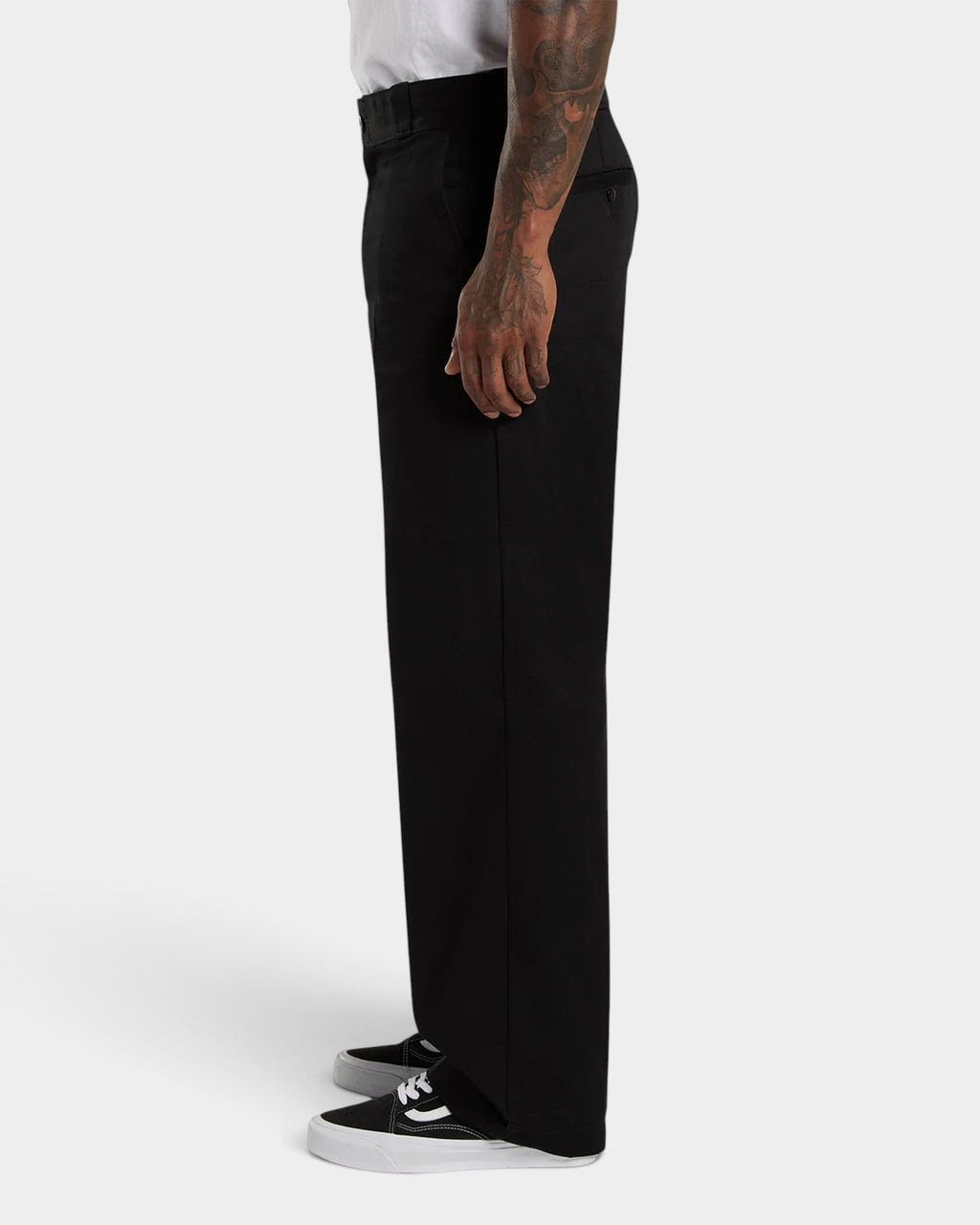 Lockwood Avenue Dickies 247 loose fit black cotton twill work pants on a model, side view