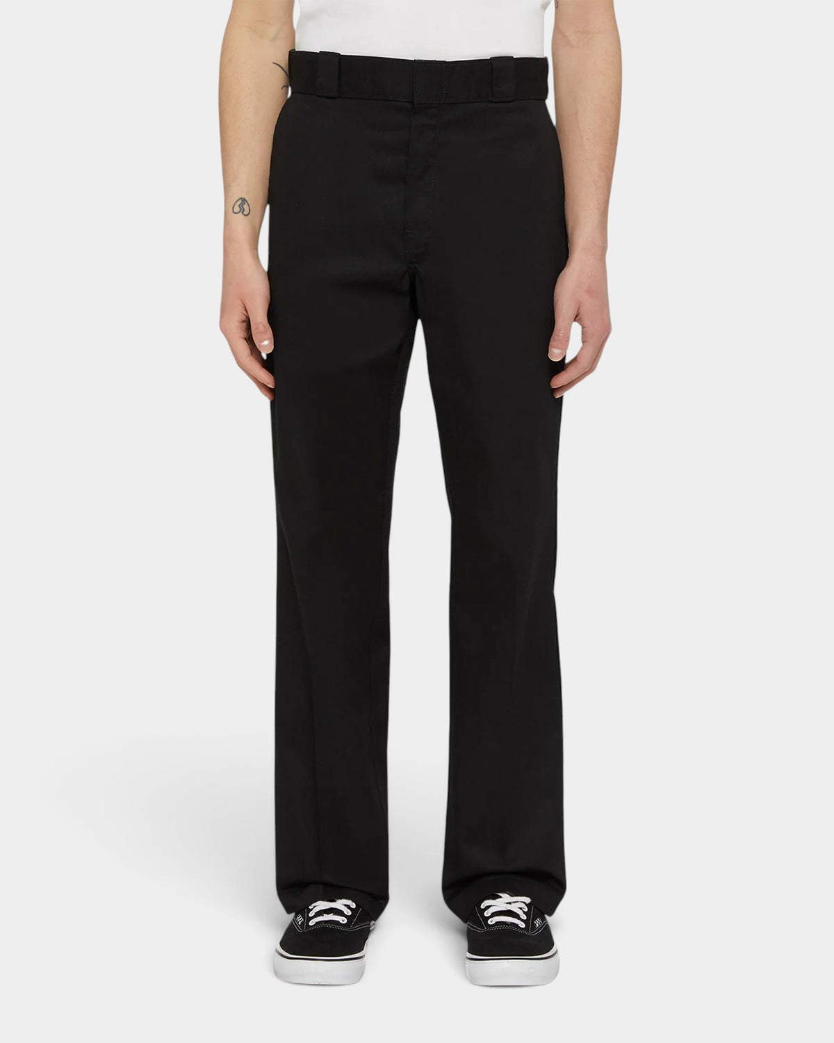 Lockwood Avenue Dickies 874 recycled black work pants with a straight leg fit and center crease on a male model