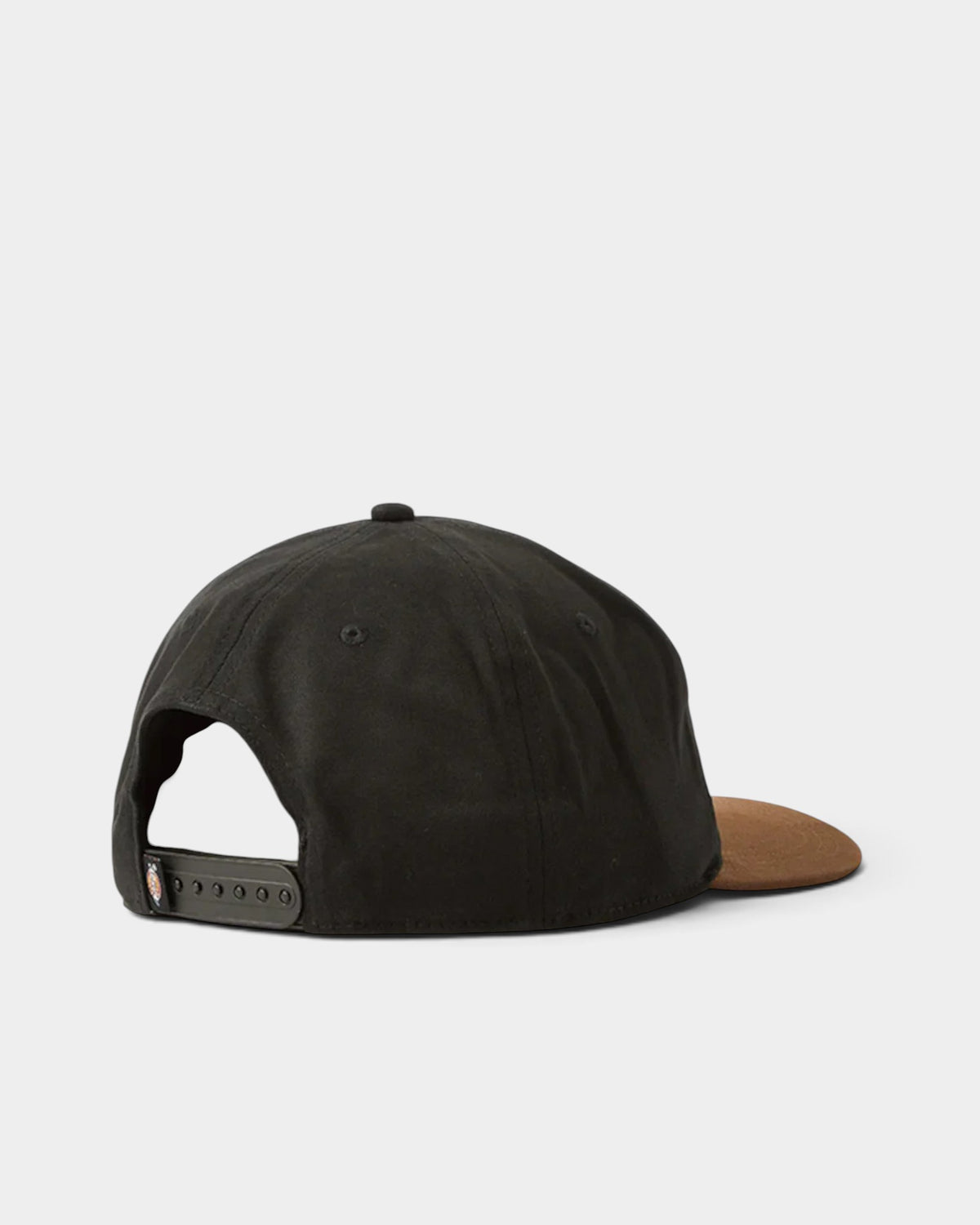 Lockwood Avenue Dickies Latty dad cap in black with a tan suede brim, shown from the back with adjustable strap.