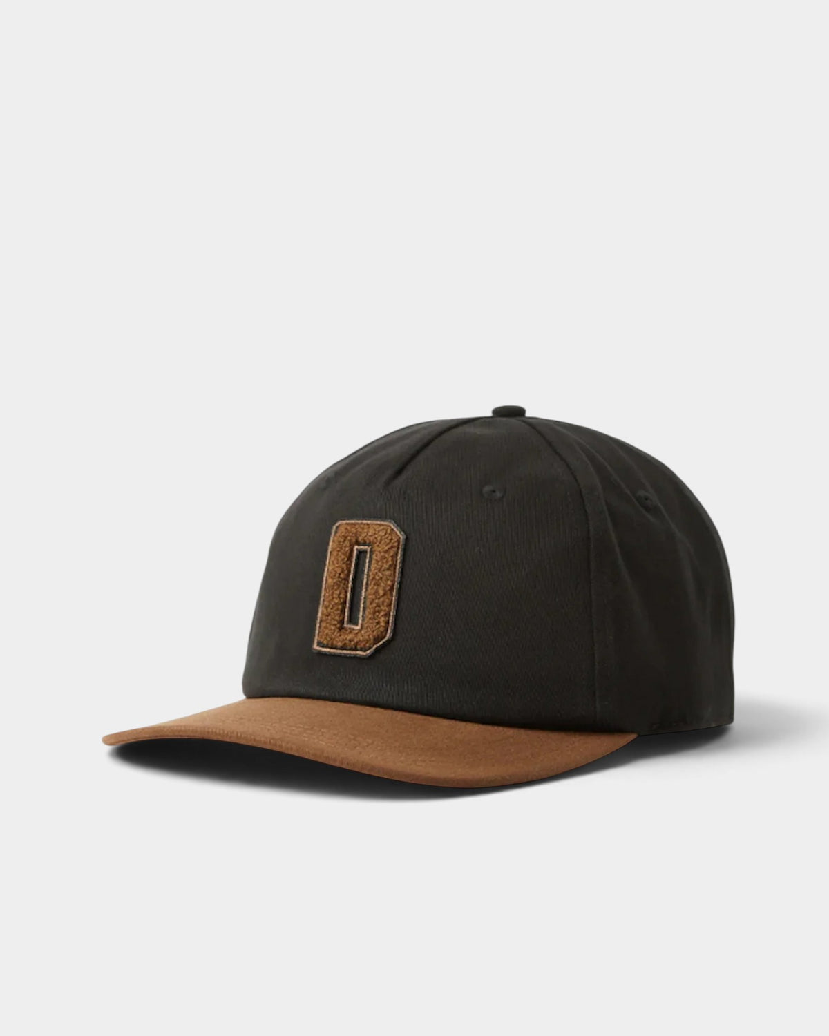 Lockwood Avenue Dickies Latty dad cap with a black crown, tan suede curved brim, and a chenille D patch.