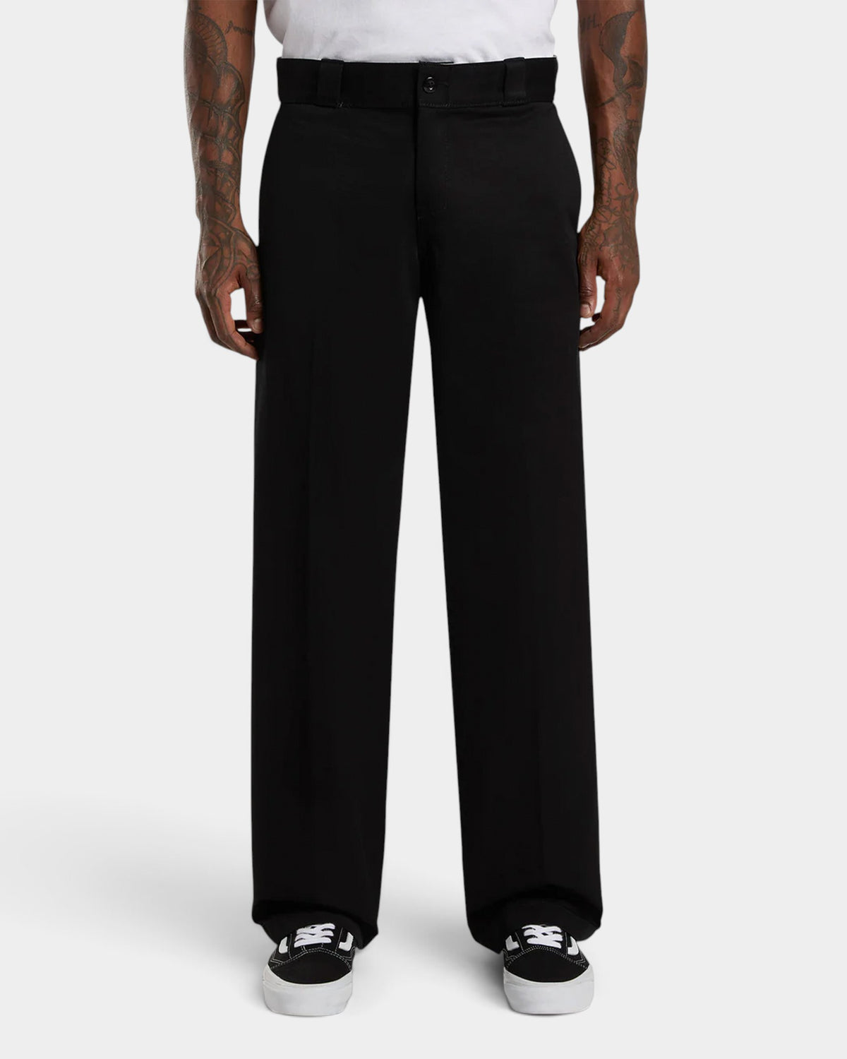 Lockwood Avenue Dickies 247 loose fit black cotton twill work pants with front crease on a model