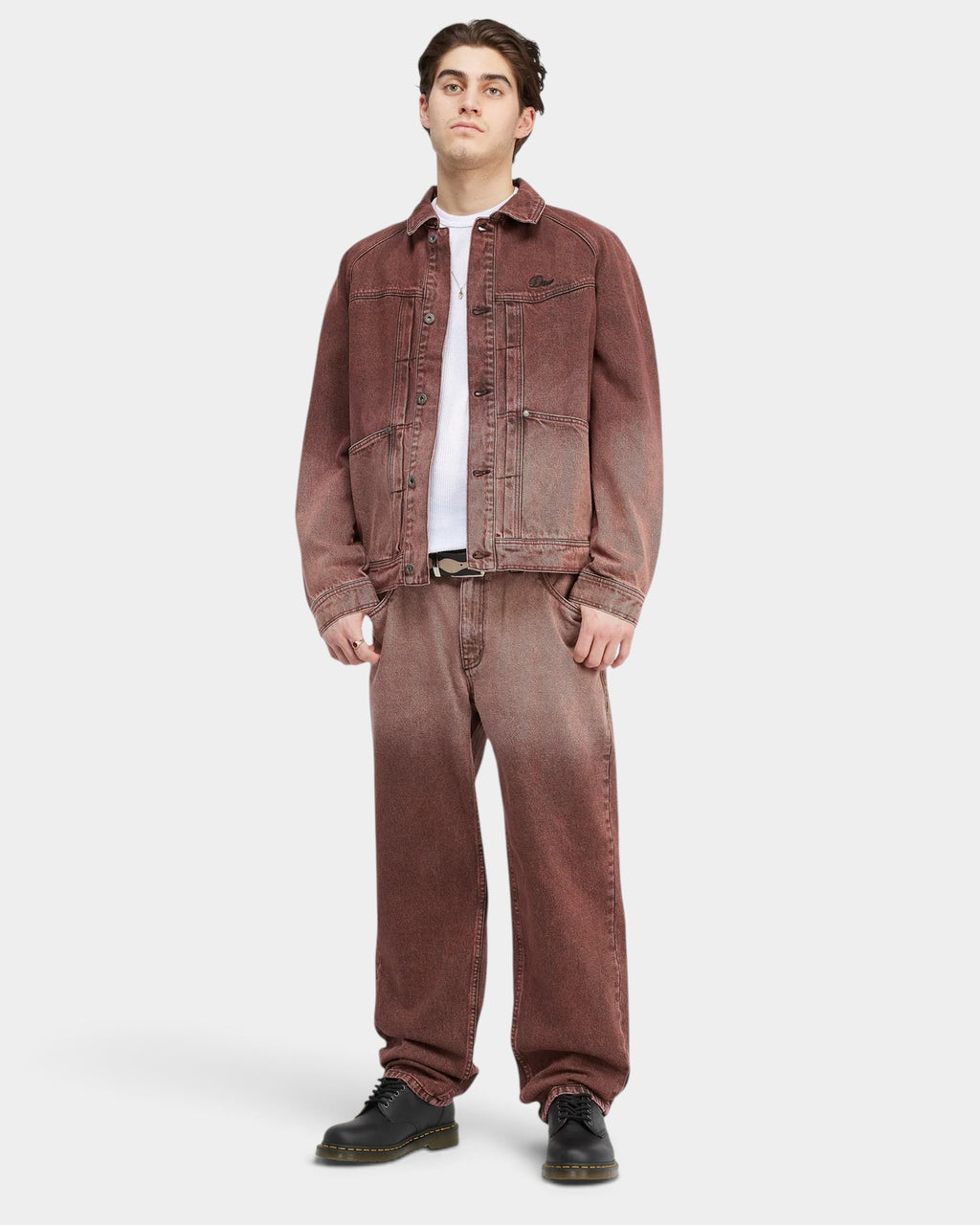 Lockwood Avenue model wearing Dime burgundy sandblasted relaxed straight leg denim pants and matching denim jacket