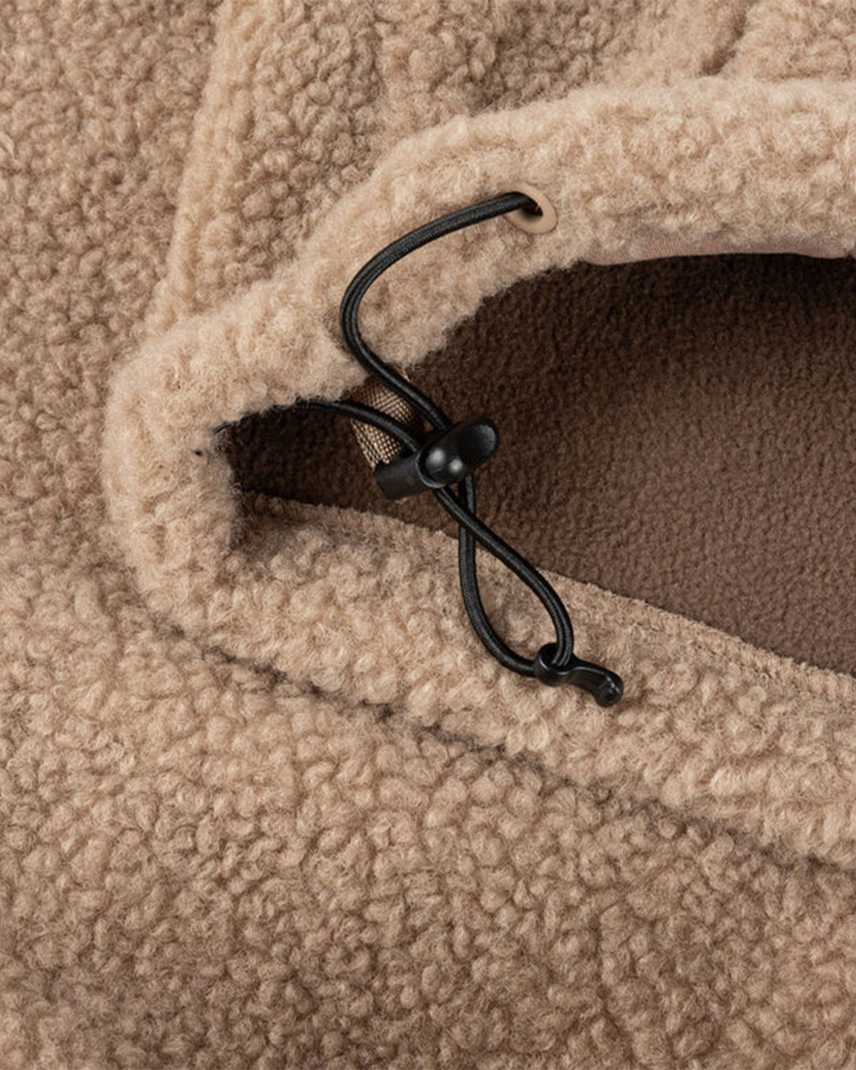 Lockwood Avenue Dime polar fleece sherpa jacket in latte beige with a black adjustable cinch cord at the hem