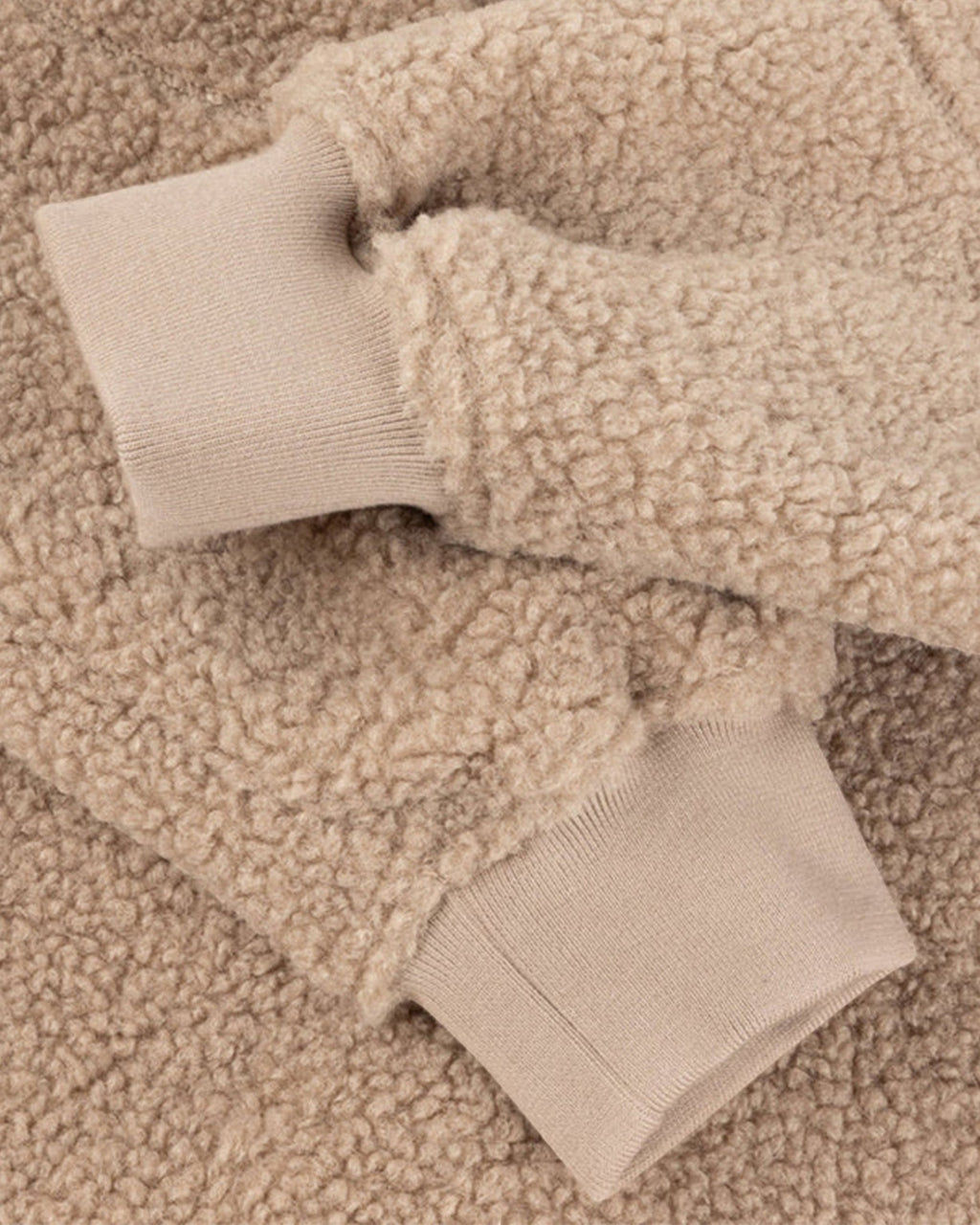 Lockwood Avenue Dime polar fleece sherpa jacket in latte beige with detailed view of ribbed cuffs and deep-pile texture