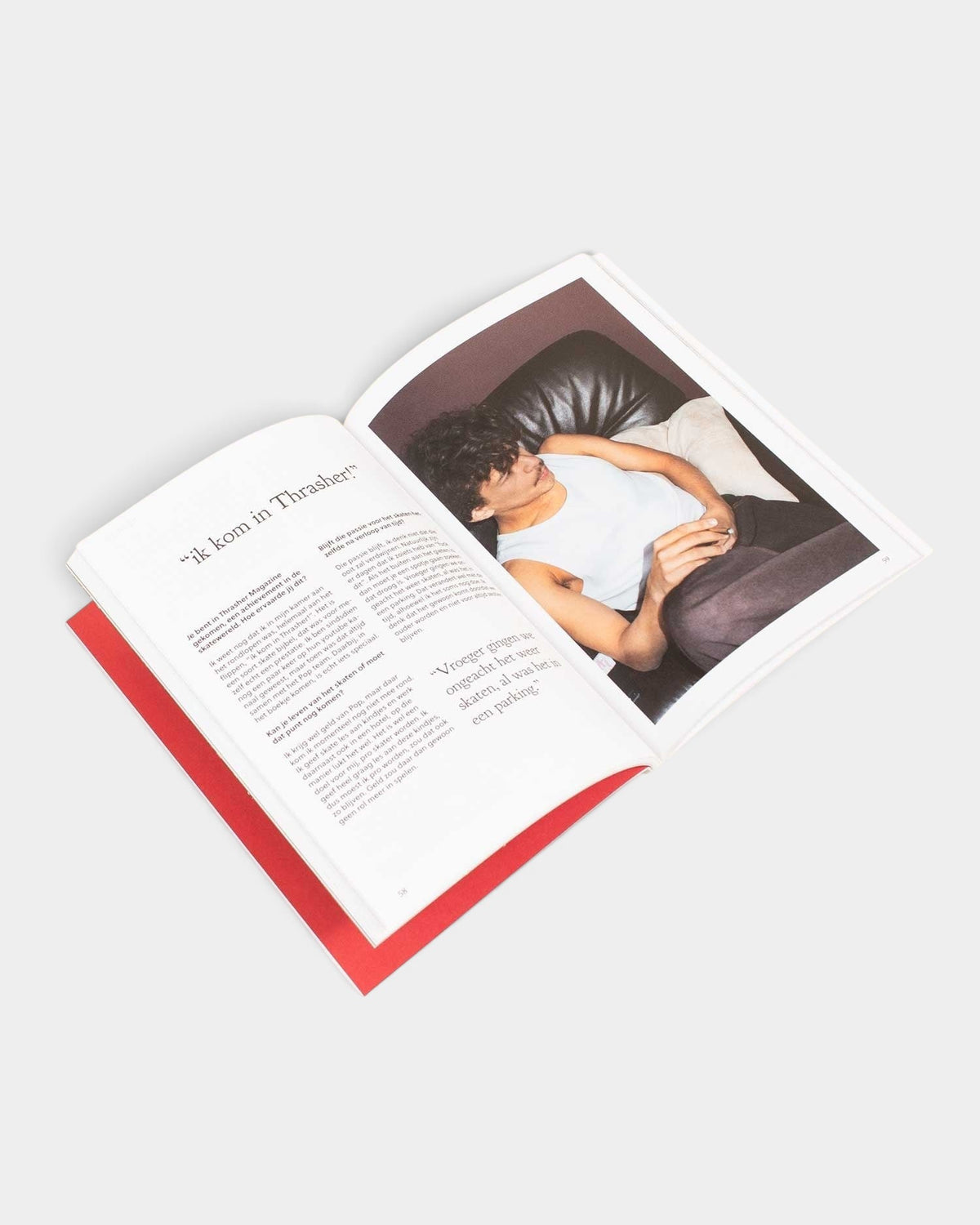 Lockwood Avenue Donnie Magazine Issue 1 open spread featuring a photo of a young man in a white tank top on a sofa