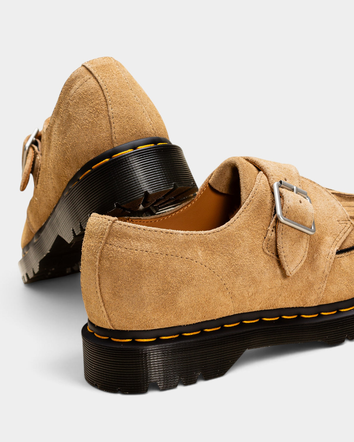 Lockwood Avenue Dr. Martens Ramsey monk-strap creepers in Savannah Tan suede with silver buckle and yellow welt stitch