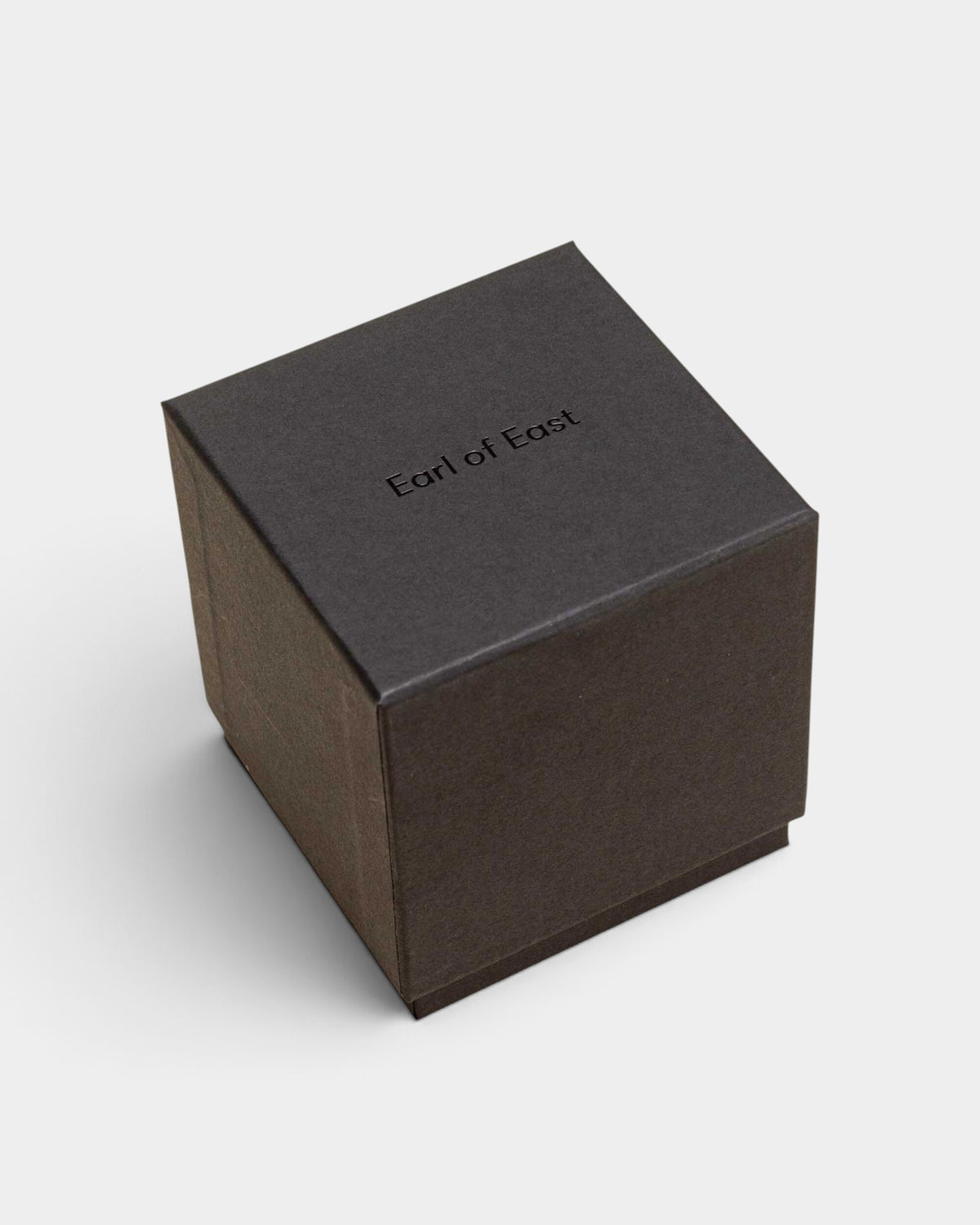 Lockwood Avenue Earl of East Elementary candle in a black rigid gift box with branded lettering