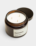 Lockwood Avenue Earl of East Elementary 500ml soy wax candle in an amber glass jar with three wicks and black lid.