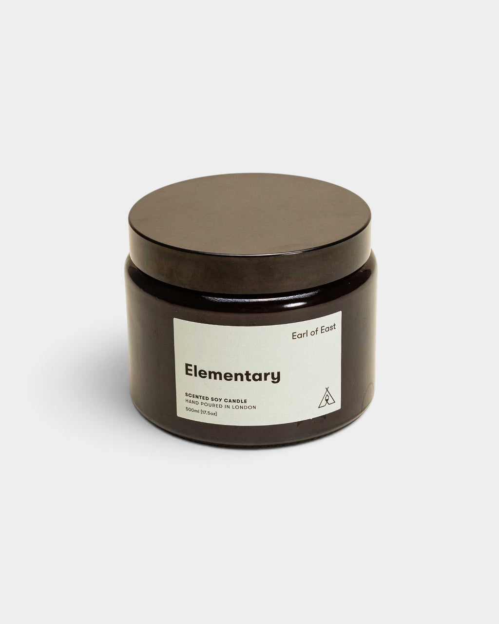 Lockwood Avenue Earl of East Elementary soy wax candle in a dark glass jar with a black lid