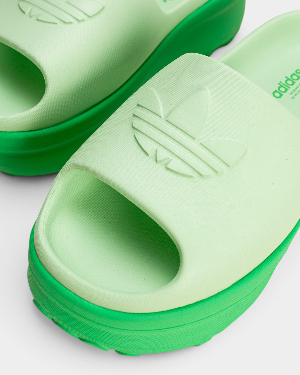 Lockwood Avenue women's energy green molded EVA foam Adifom Stan slide sandals with embossed Trefoil logo