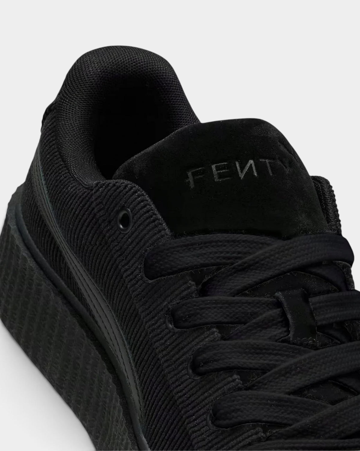 Lockwood Avenue Fenty x Puma Creeper Phatty sneakers in black corduroy with a suede tongue and platform sole.