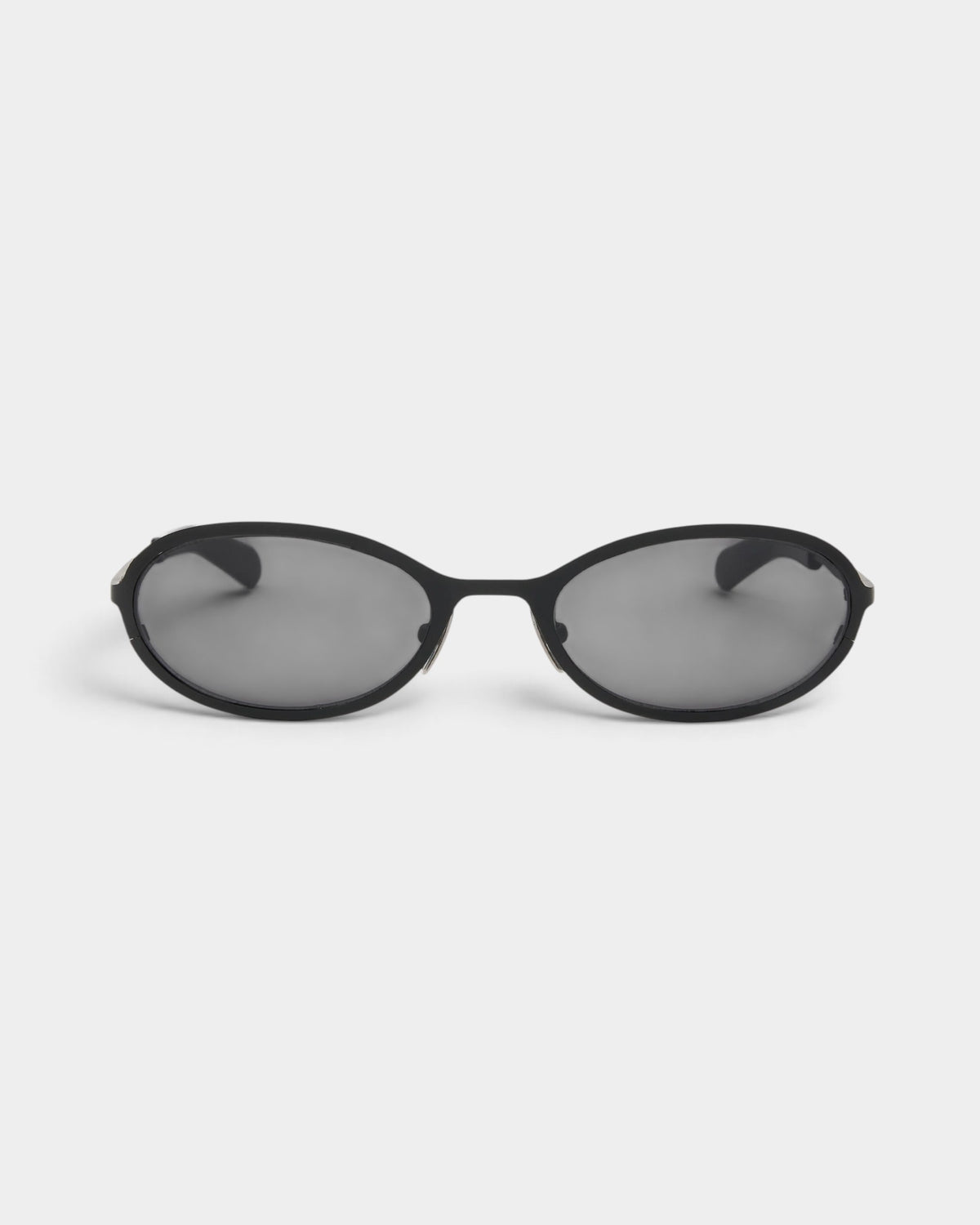 Lockwood Avenue Flatlist Cohen sunglasses in solid black with a minimalist oval frame and Carl Zeiss lenses.