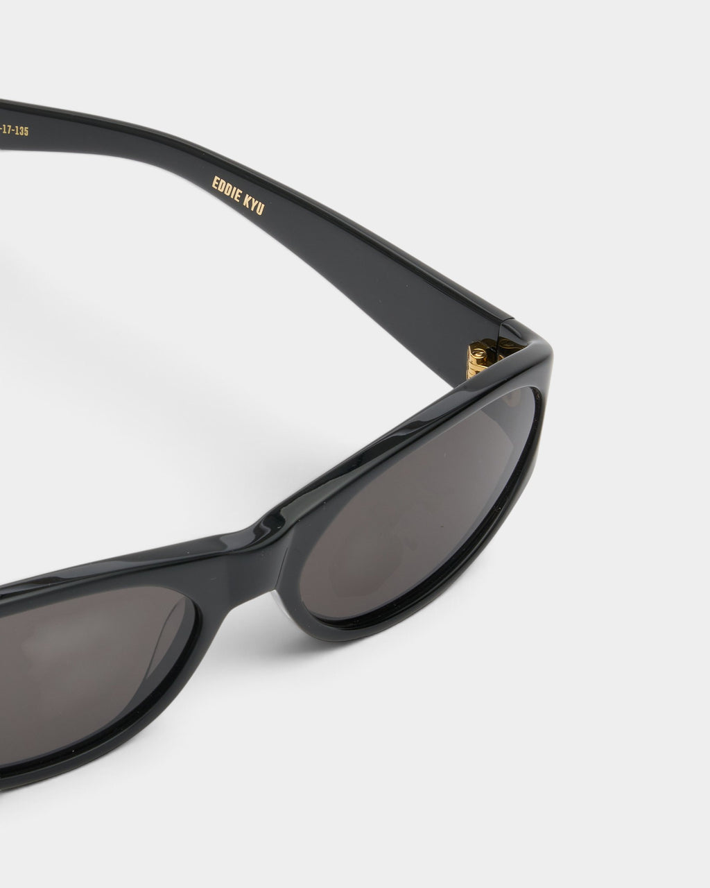 Lockwood Avenue Flatlist Eddie Kyu black acetate sunglasses with gold hinge detail and Zeiss lenses