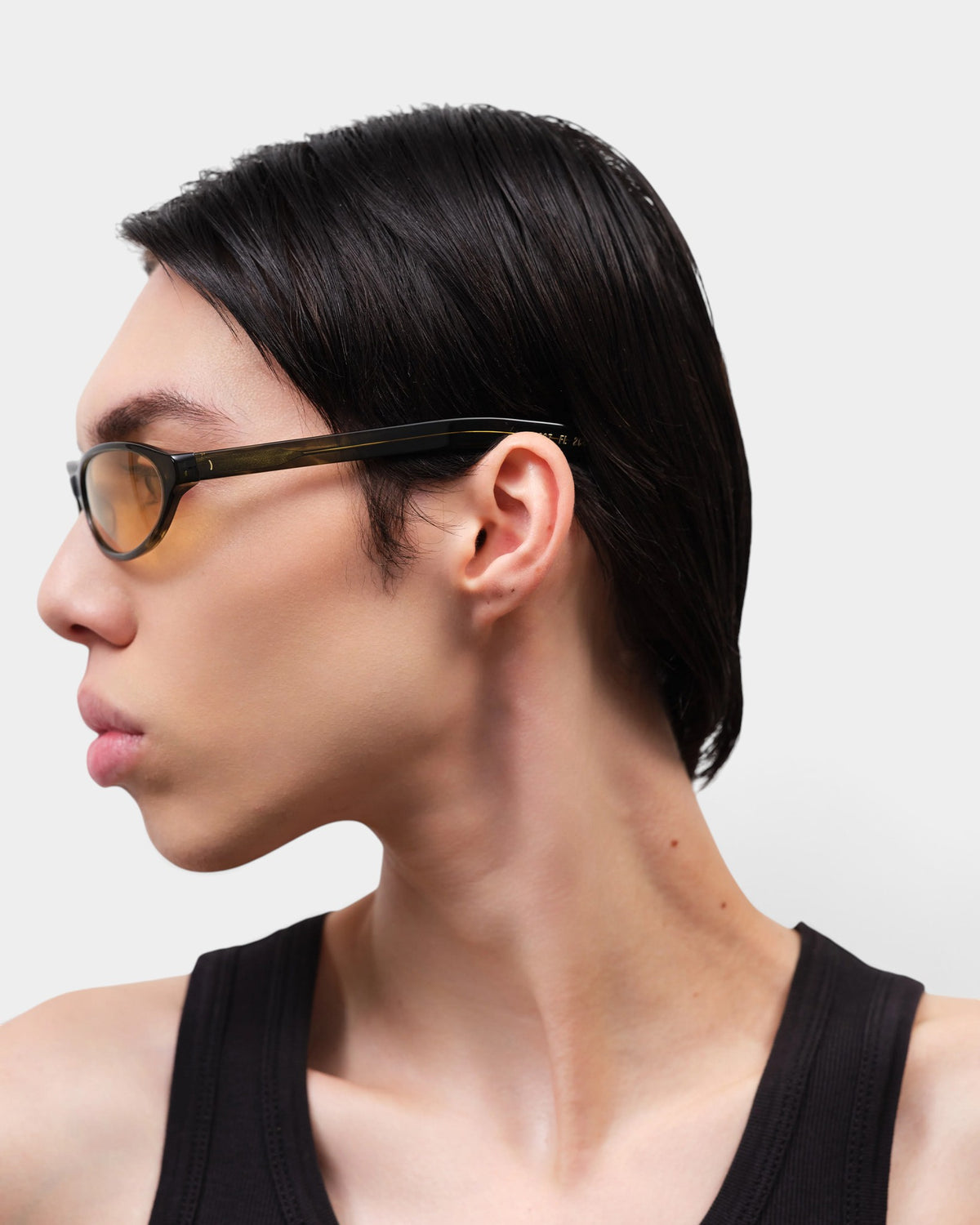 Lockwood Avenue Flatlist Olympia sunglasses in olive horn acetate with yellow Carl Zeiss lenses worn by a model